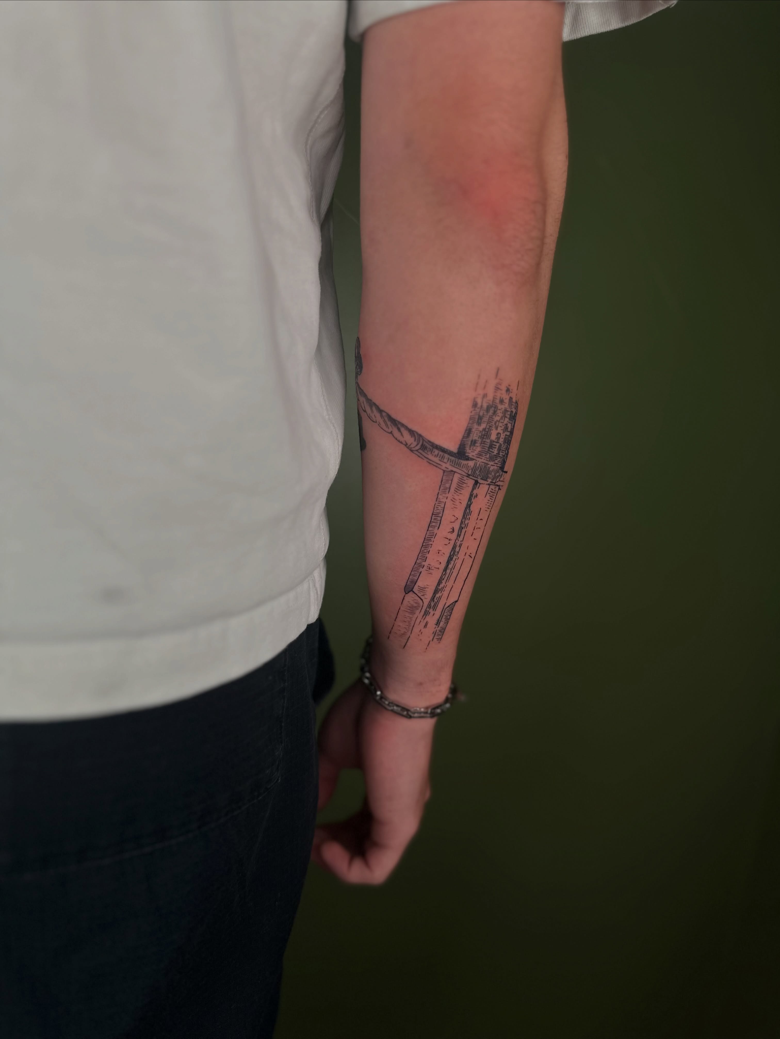 Bridge black and grey tattoo on the forearm by Nikolas Tapio Aatos Mäkelä