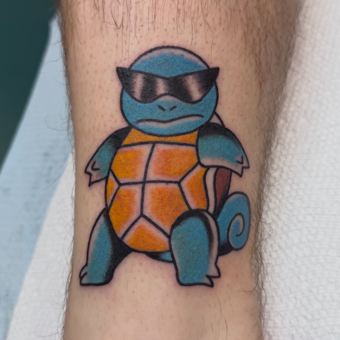 Squirtle American traditional tattoo on the forearm by Carl Testi