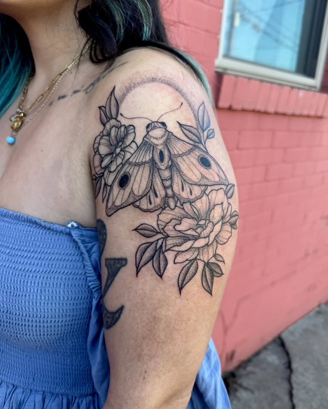 Moth and flowers fine line tattoo on the shoulder by Tara Woods