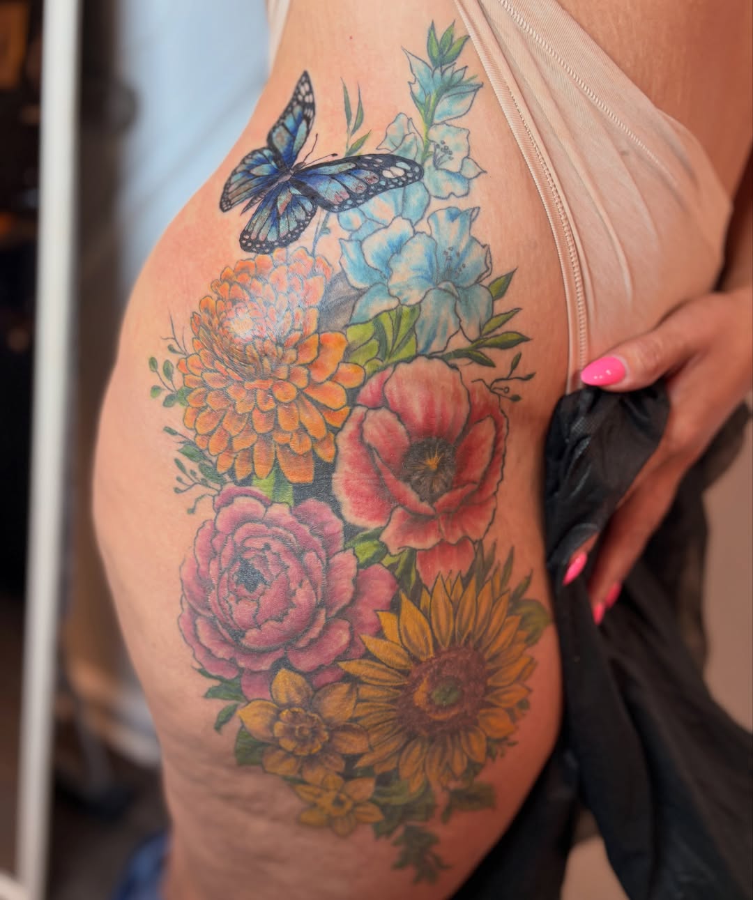 Flower bouquet new school tattoo on the thigh by Inked By E, Philadelphia, Pennsylvania