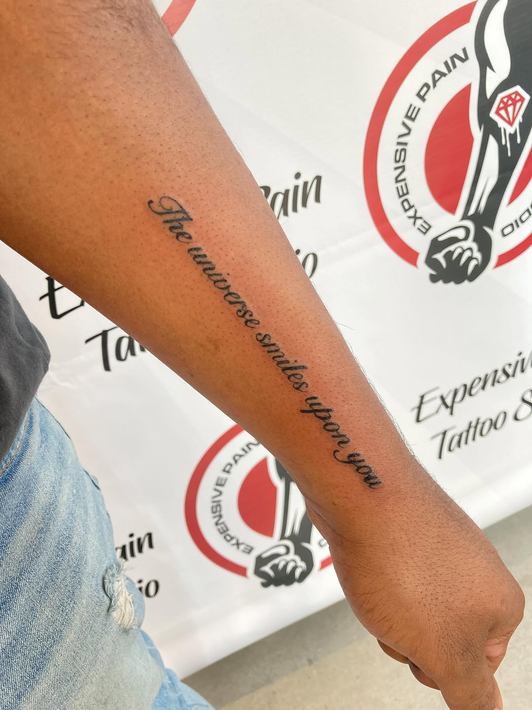 Script lettering lettering tattoo on the forearm by Jixonai C