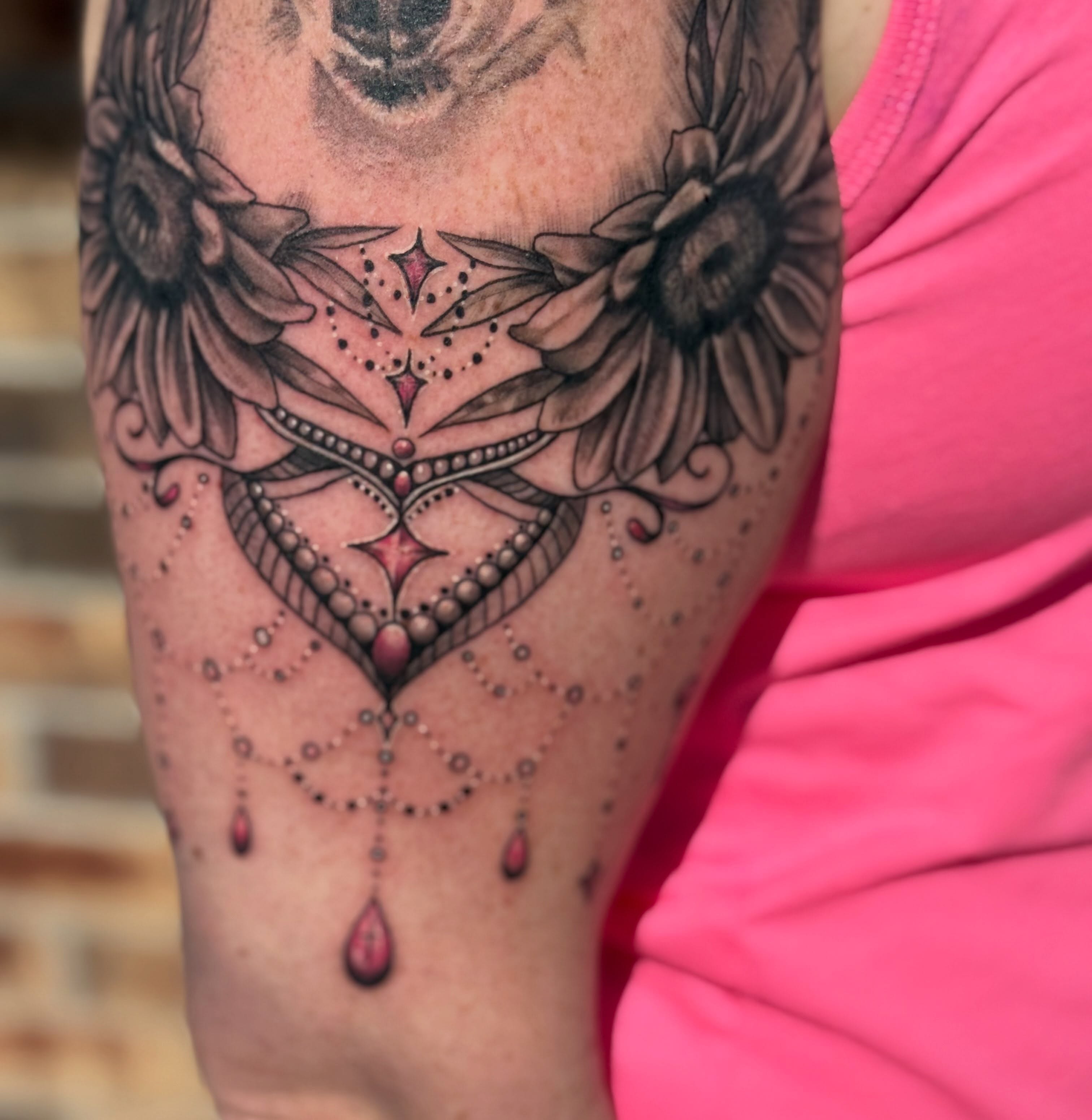 Geometric mandala dotwork tattoo on the forearm by Lauren Horness