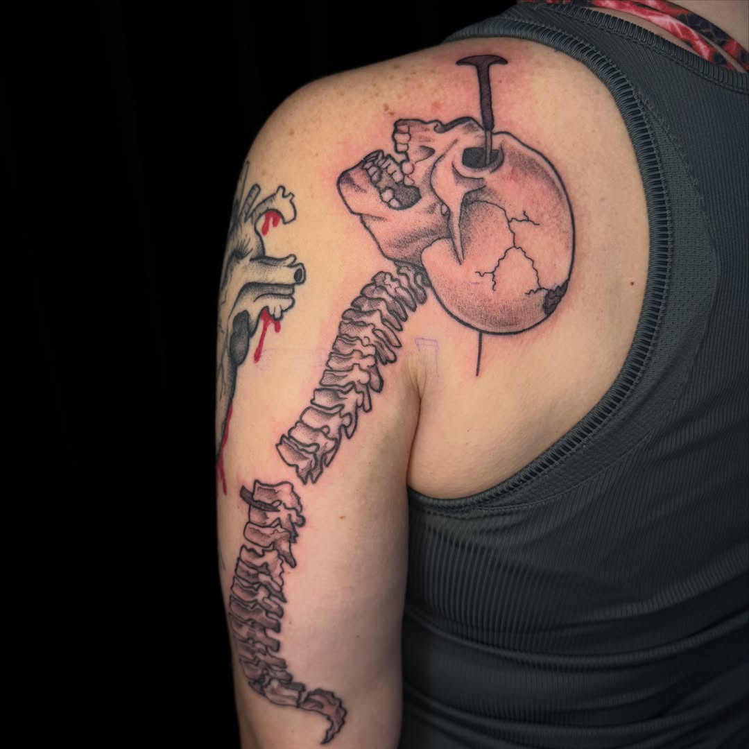 Spine and skull realism tattoo on the shoulder by ✧˖°. Jordan