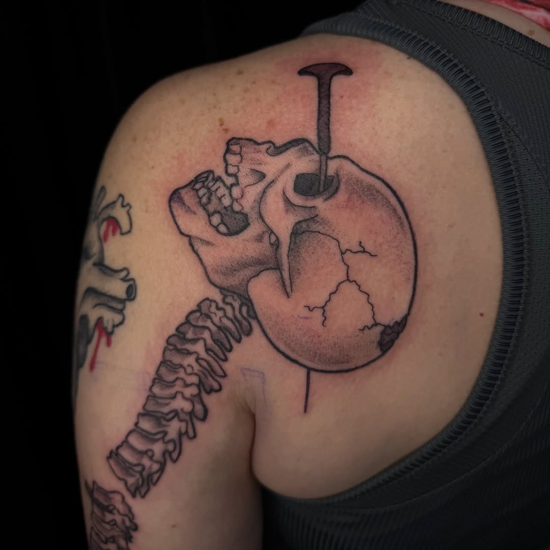 Skull and heart black and grey tattoo on the shoulder by ✧˖°. Jordan