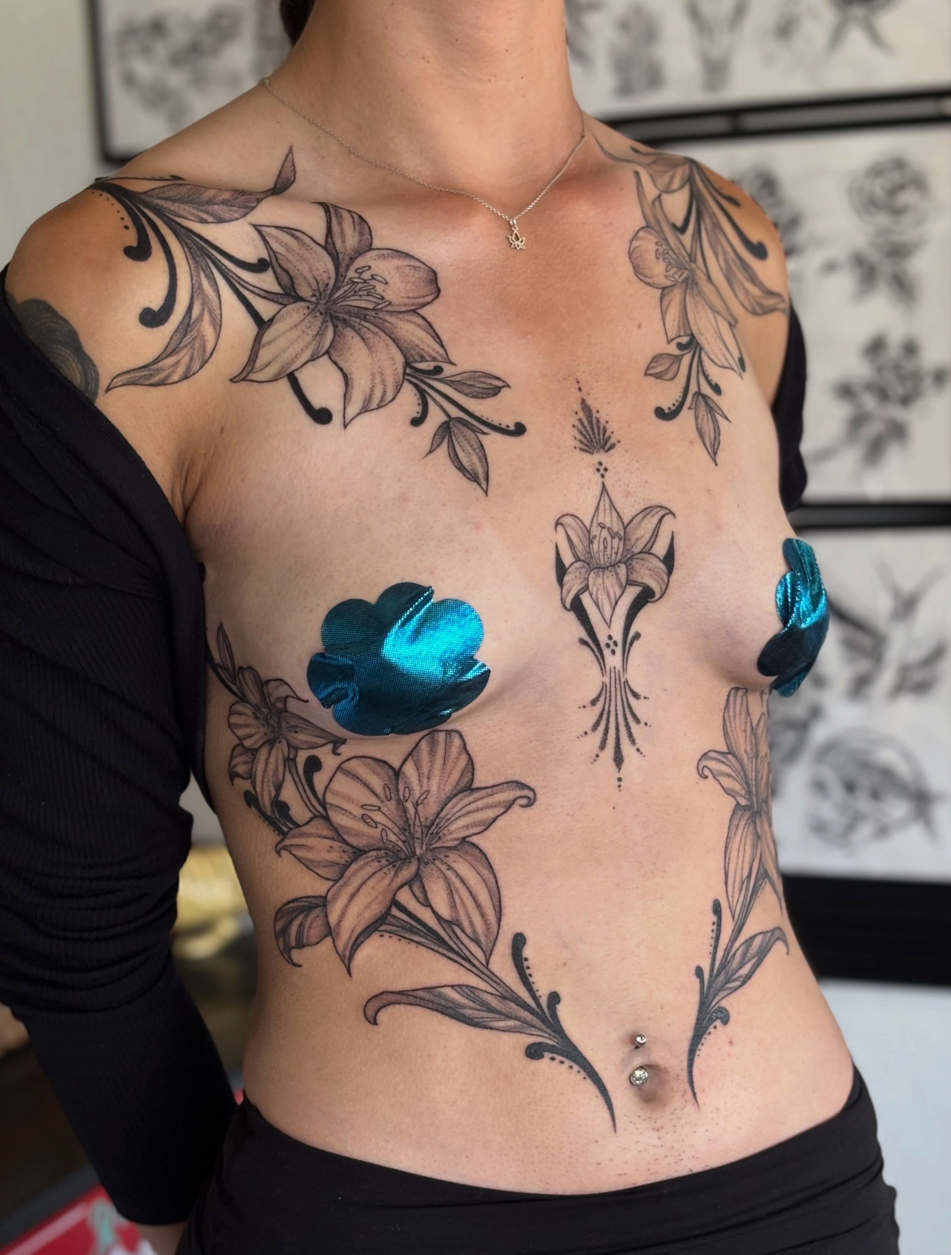 Floral arrangement black and grey tattoo on the chest by ✤ Ornamental Tattoo Artist ✤