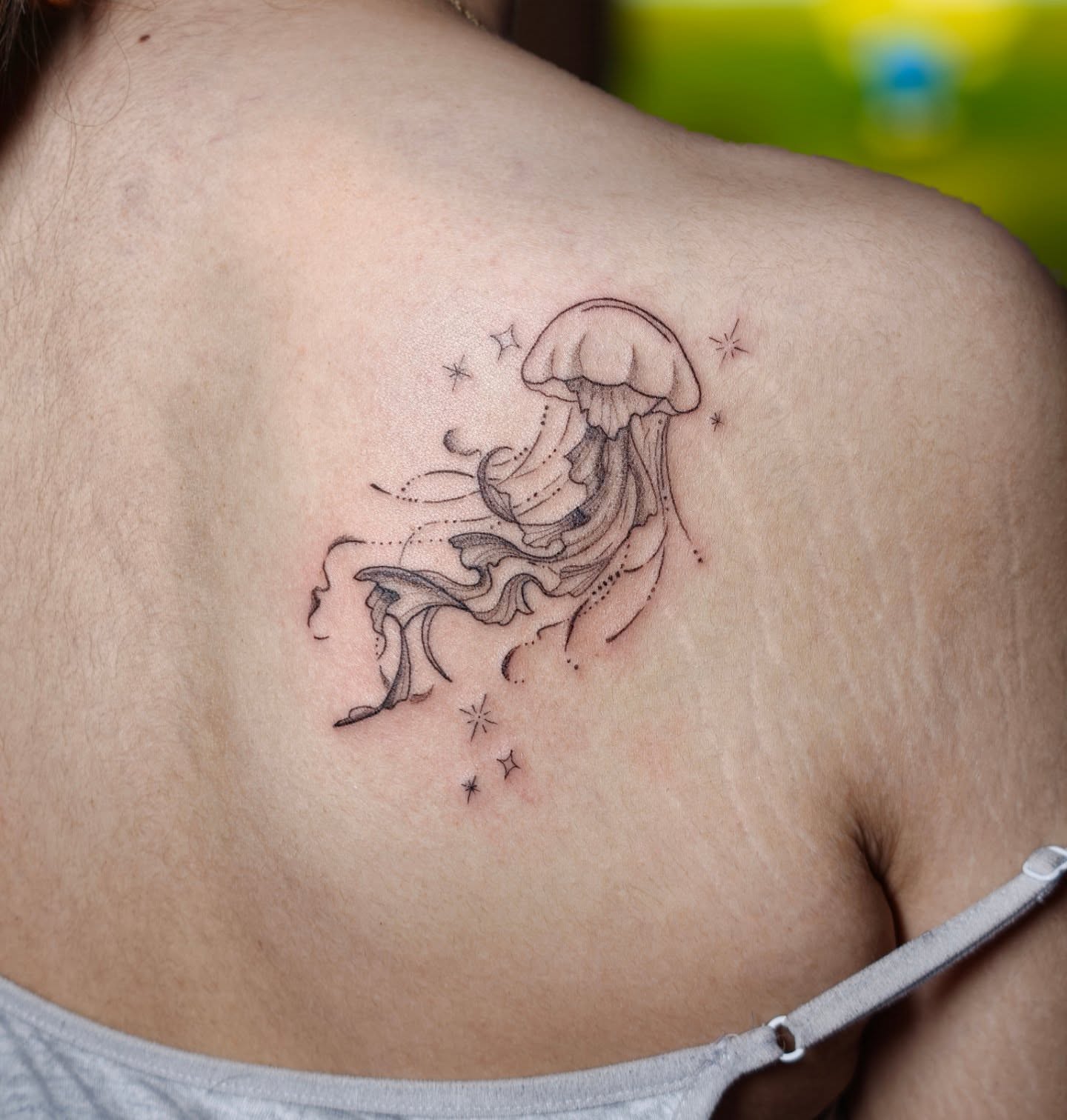 Jellyfish dotwork tattoo on the shoulder by Dani Sandoval, Anaheim, California