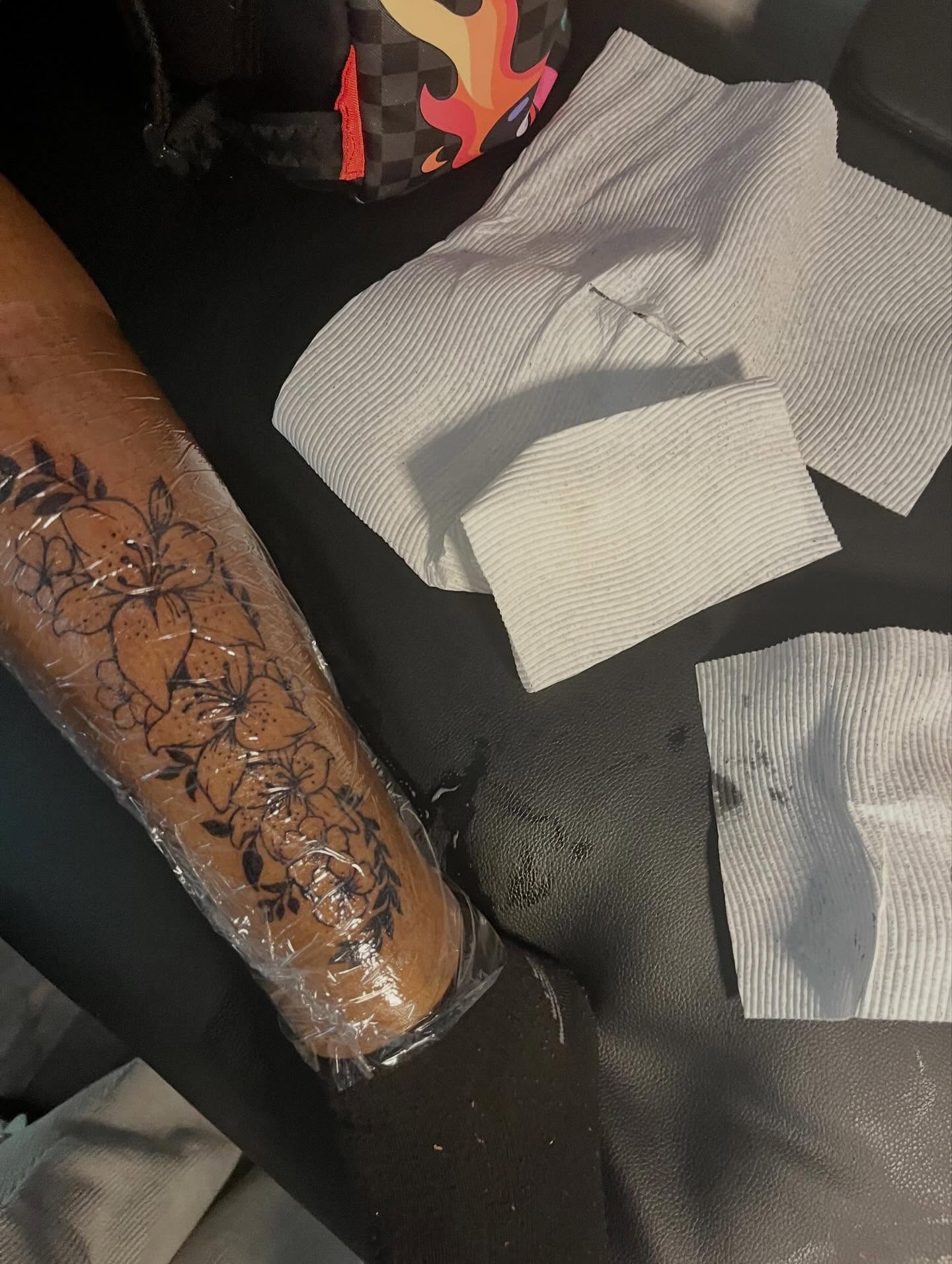 Floral design black and grey tattoo on the forearm by π Westside
