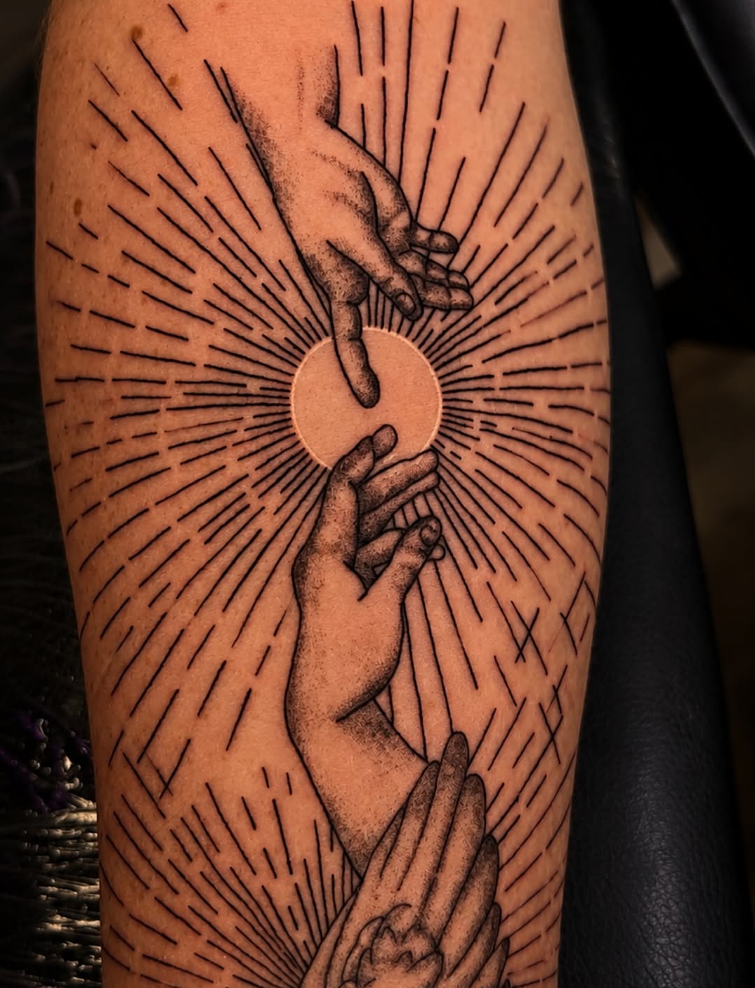 Reaching hands with sun rays sketch tattoo on the forearm by Cece, Las Vegas, Nevada