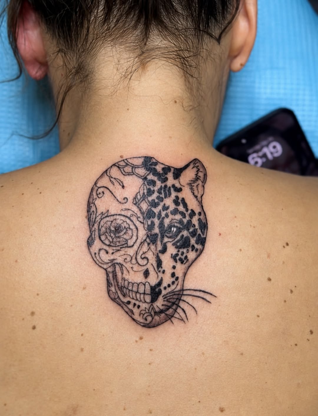 Skull and leopard realism tattoo on the back by Cece, Las Vegas, Nevada
