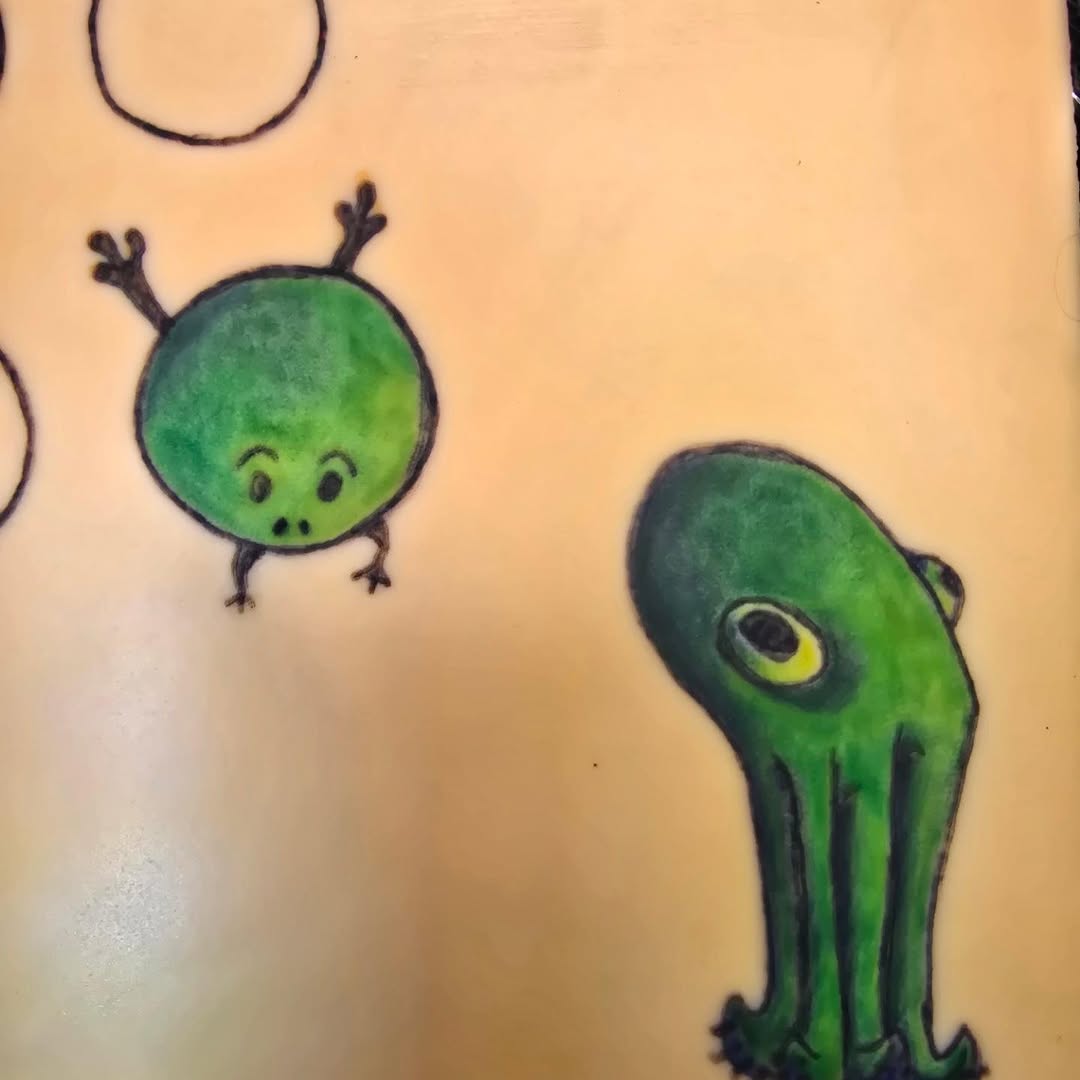 Cartoon aliens tattoo by Catherine B