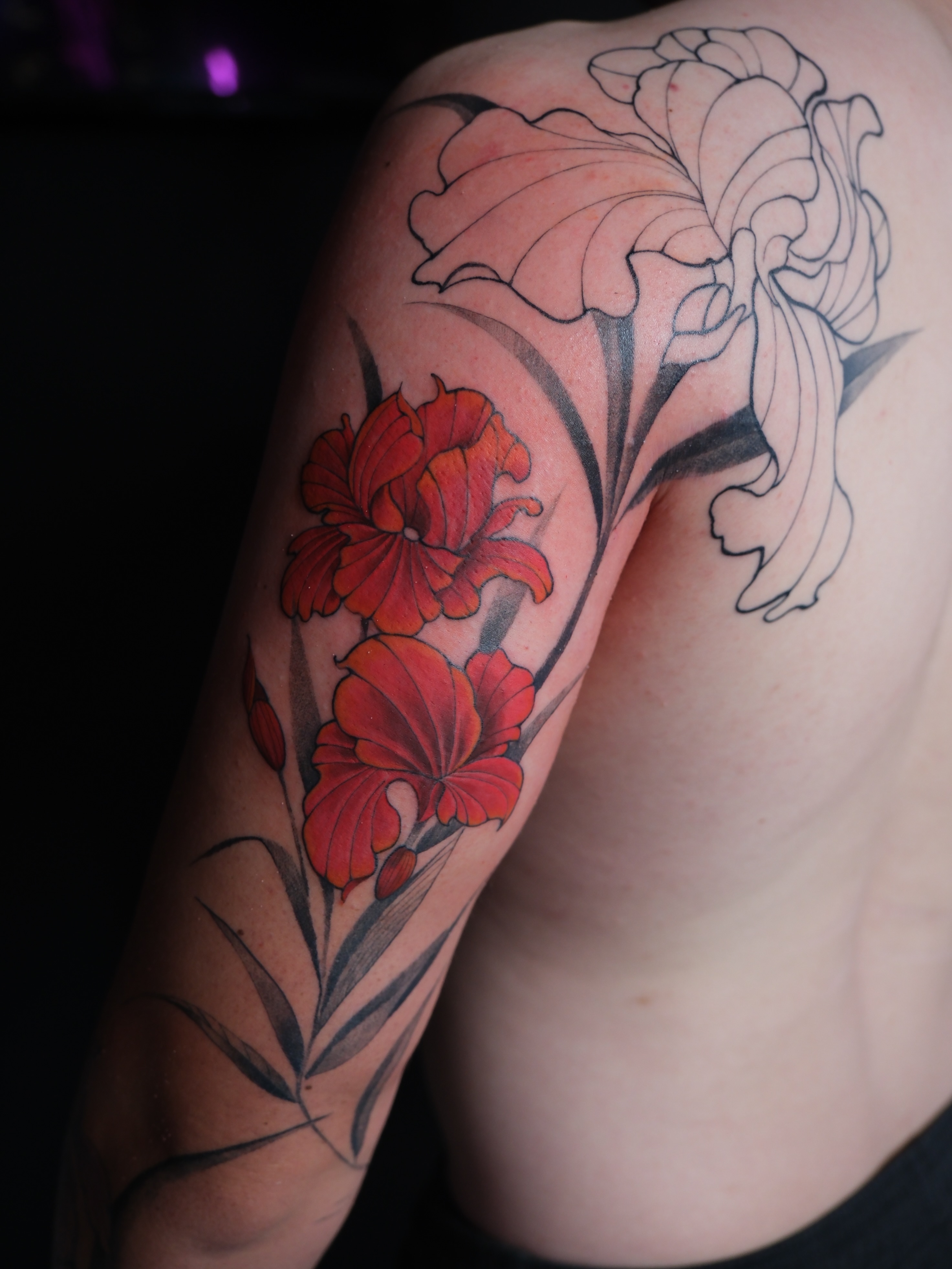 Red flowers black and grey tattoo on the shoulder by Vu Nguyen