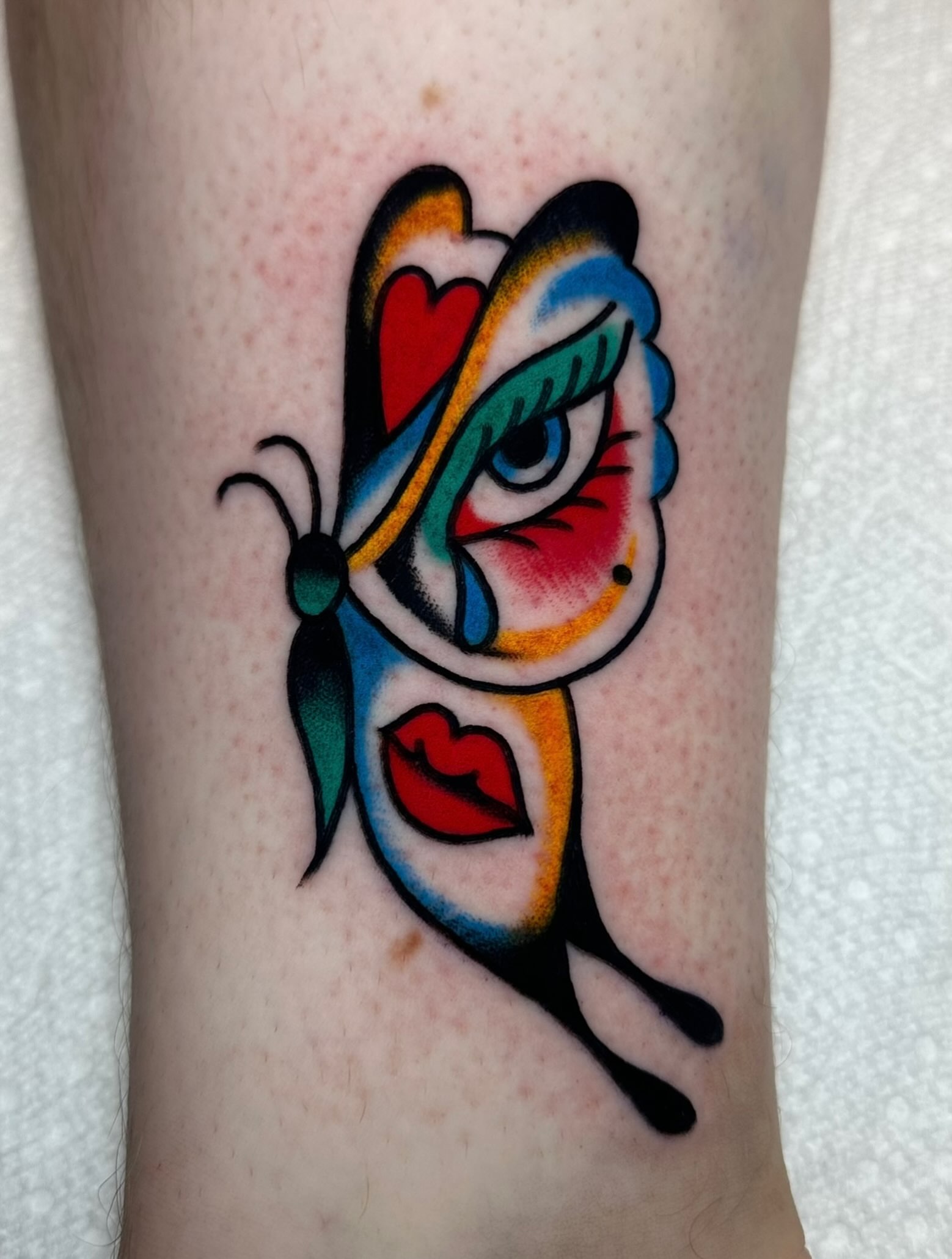 Butterfly American traditional tattoo on the forearm by Zahra Niedermann
