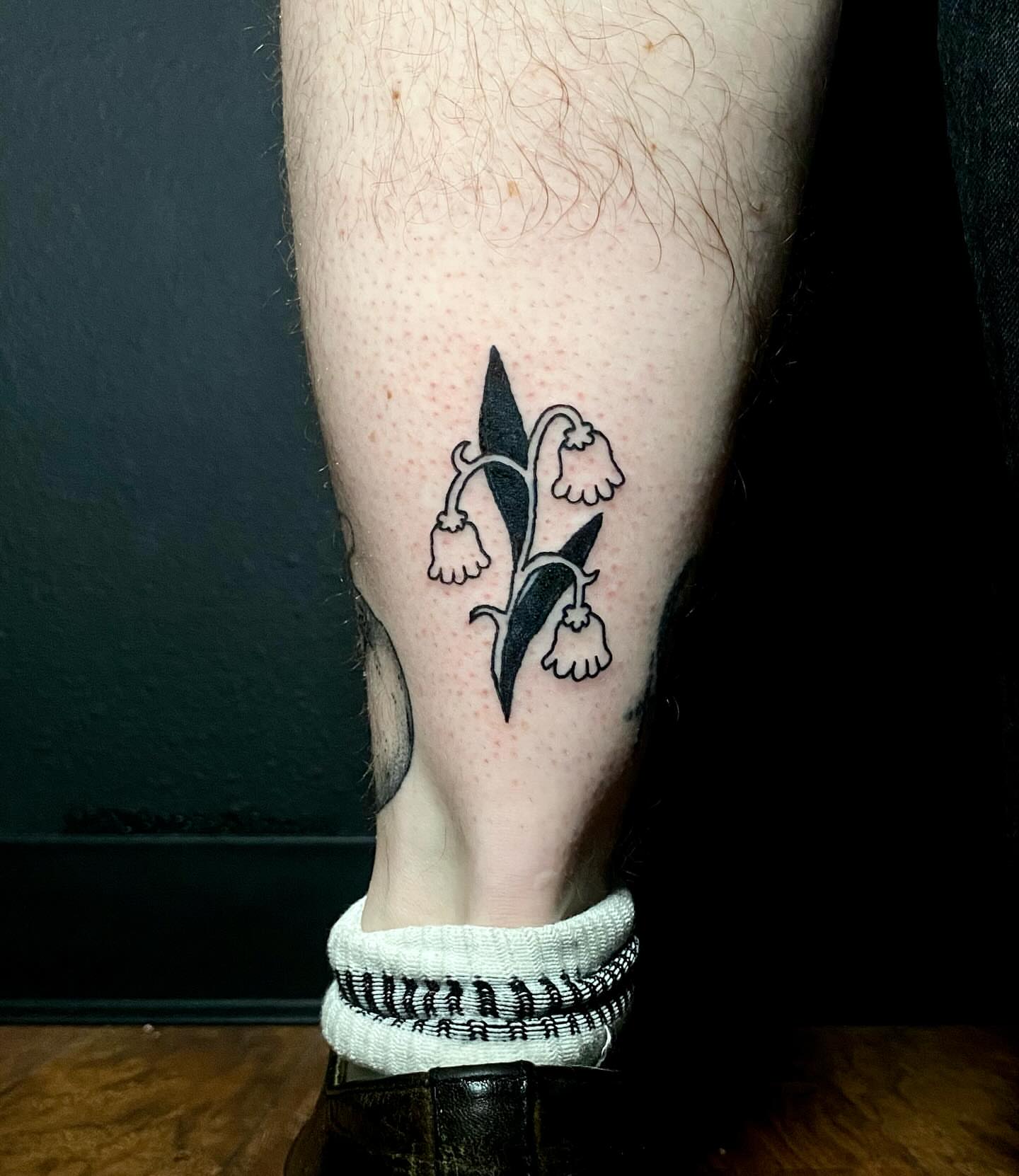 Lily of the valley black and grey tattoo on the forearm by ollie, Portland, Oregon