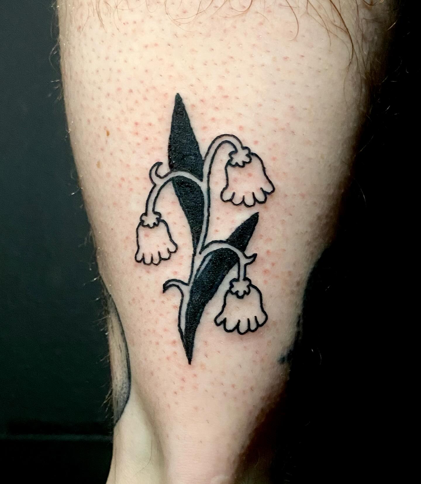 Lily of the valley black and grey tattoo on the forearm by ollie, Portland, Oregon
