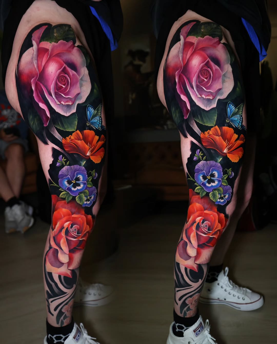 Roses and butterflies neo-traditional tattoo on the leg by Marek Pawlik