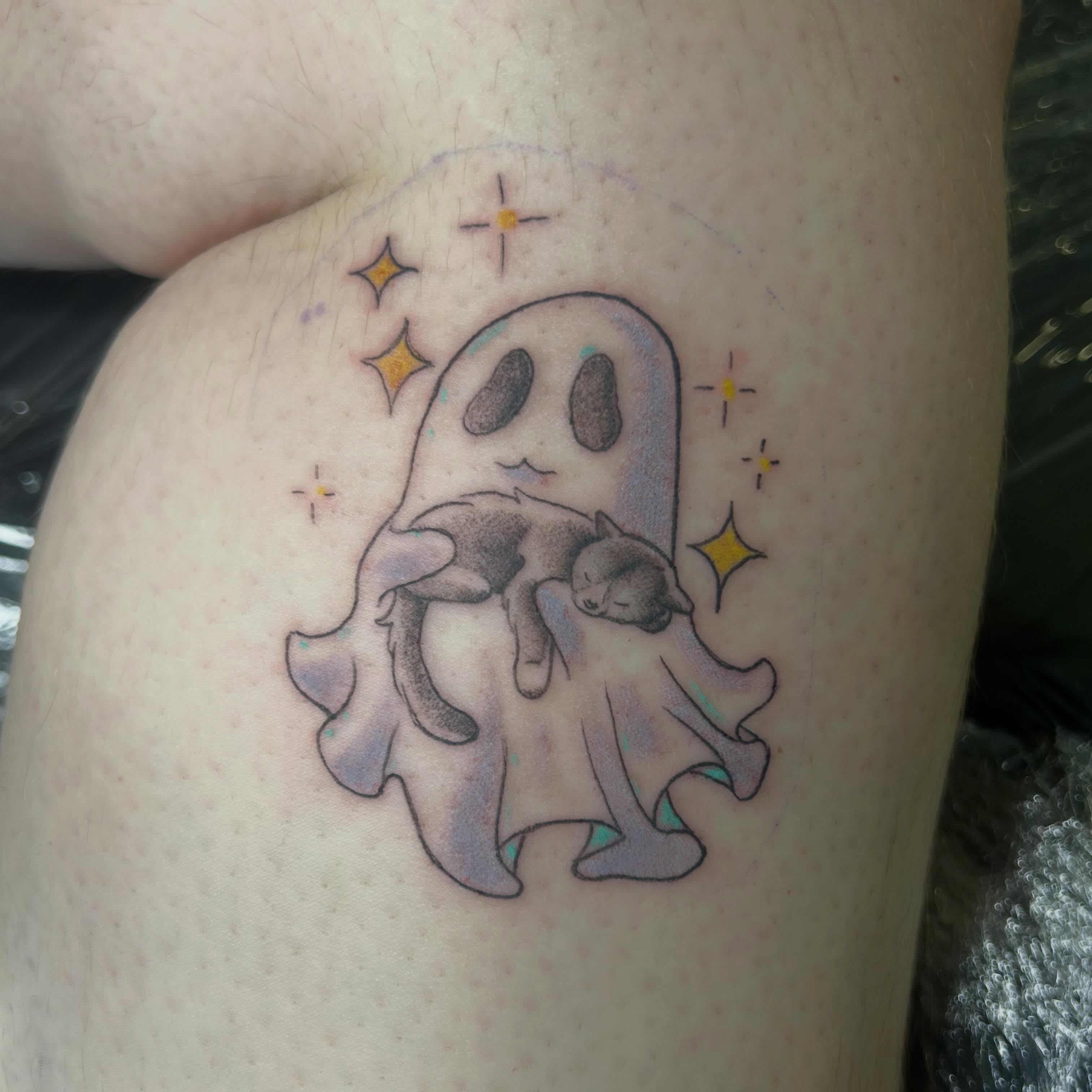 Ghost with cat dotwork tattoo on the thigh by Reilley Earles