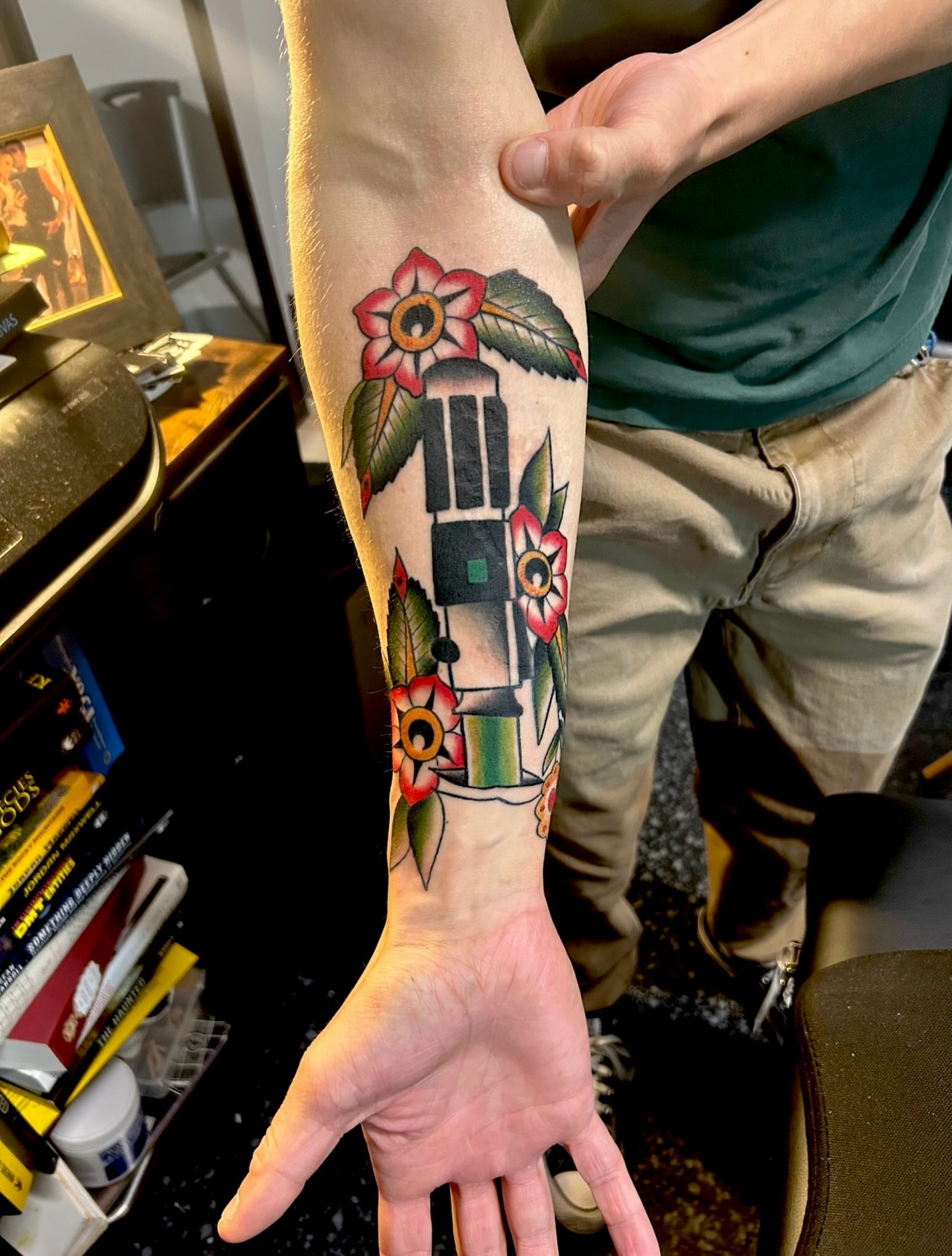 House with flowers American traditional tattoo on the forearm by Jamie Winn