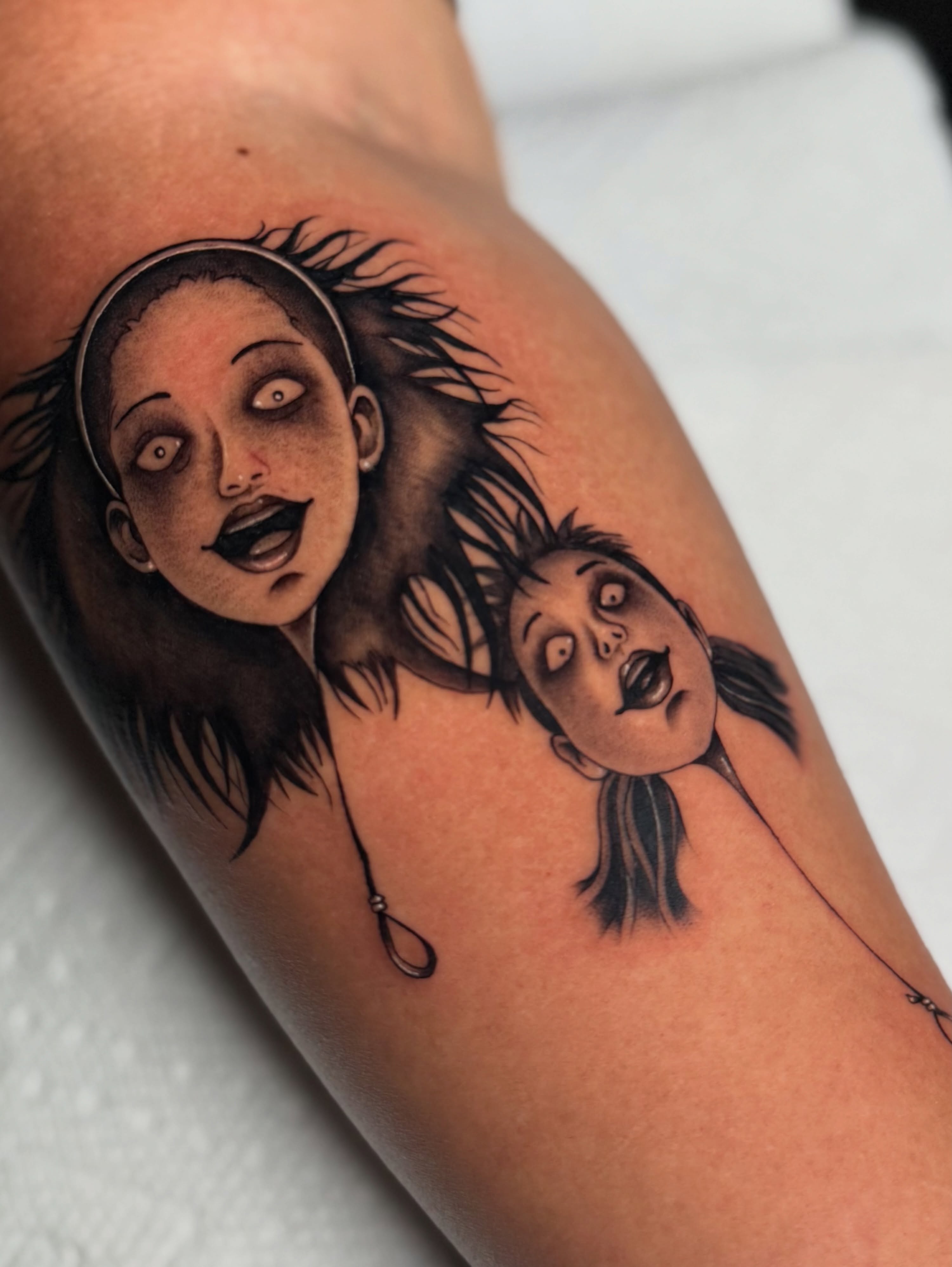 Zombie mother and daughter dark realism tattoo on the forearm by Alexia