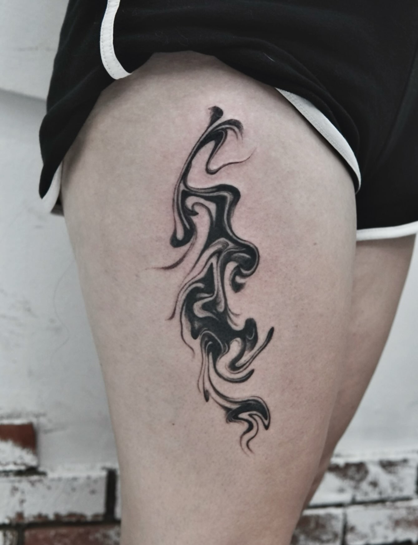 Abstract flame tribal tattoo on the thigh by ๐๐๐๐ ๐๐๐๐๐๐ ๐๐๐๐๐