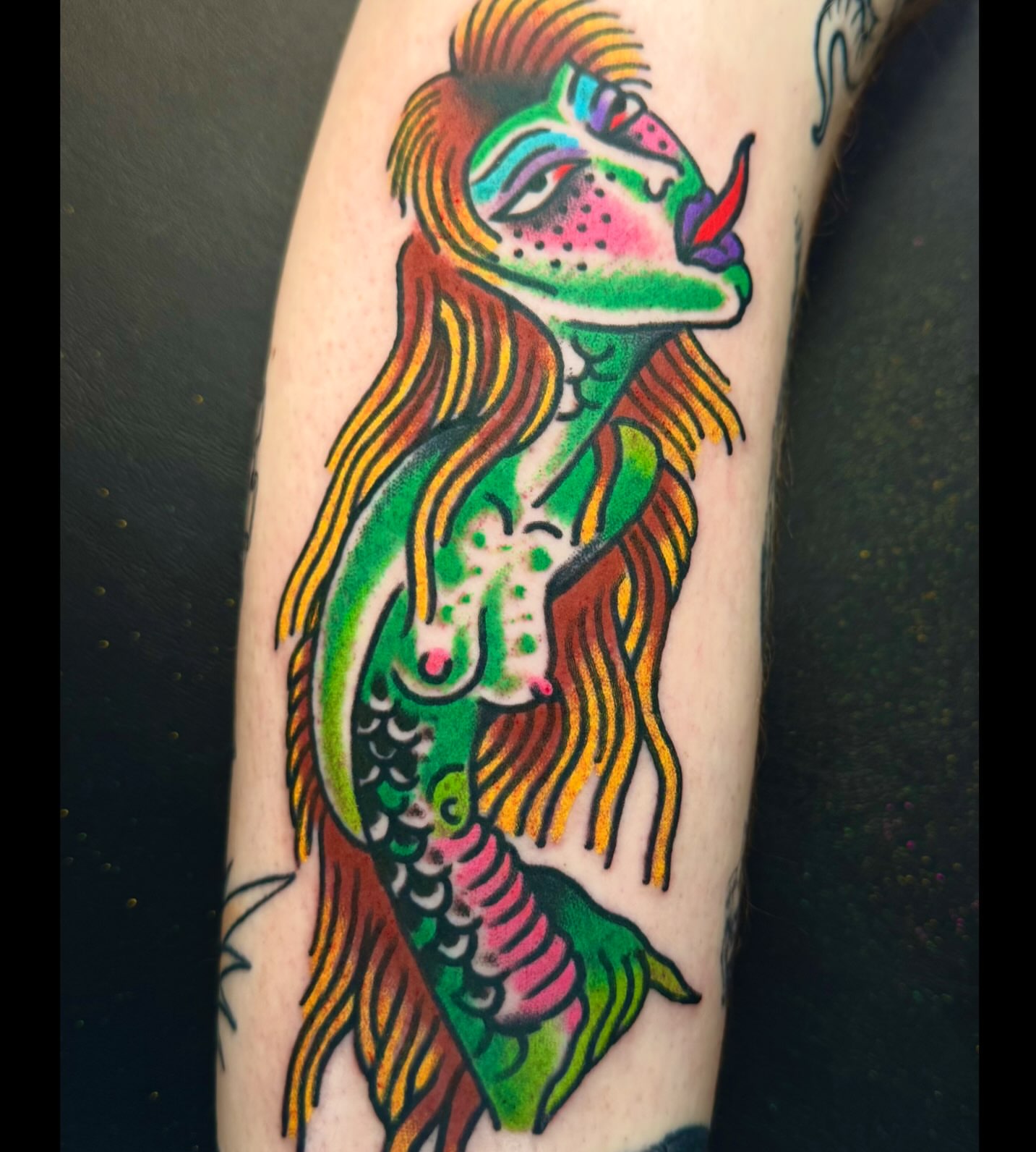 Mermaid new school tattoo on the forearm by Sam Hambrick, Watchung NJ