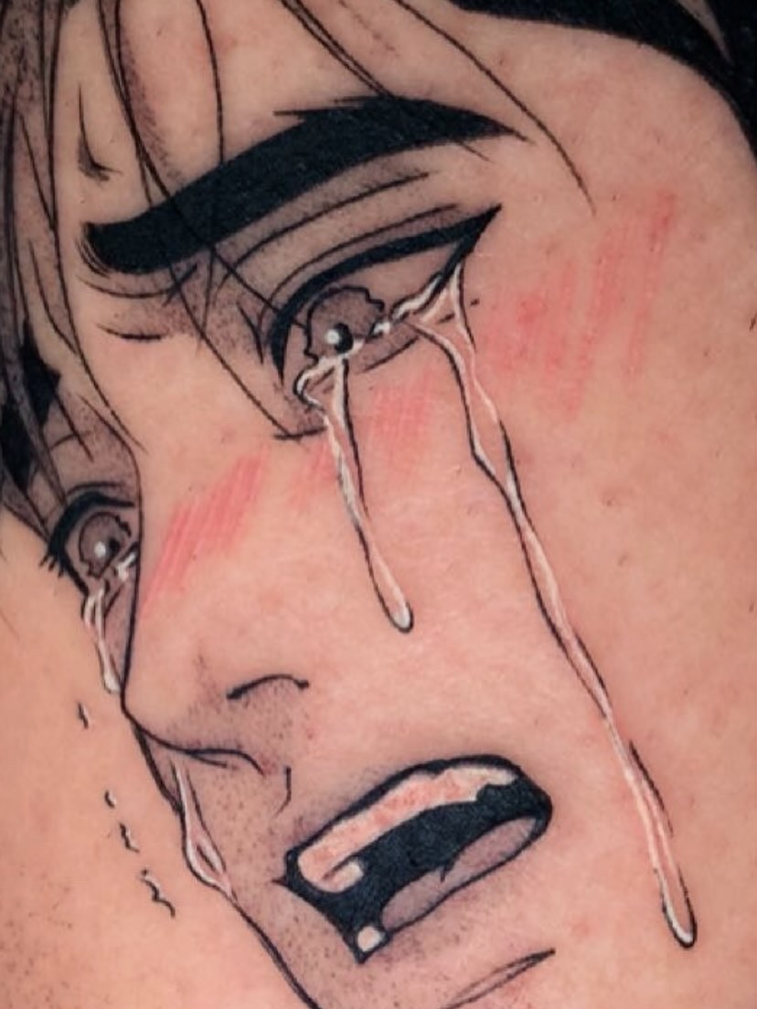 Tearful face realism tattoo by Maddie Rees