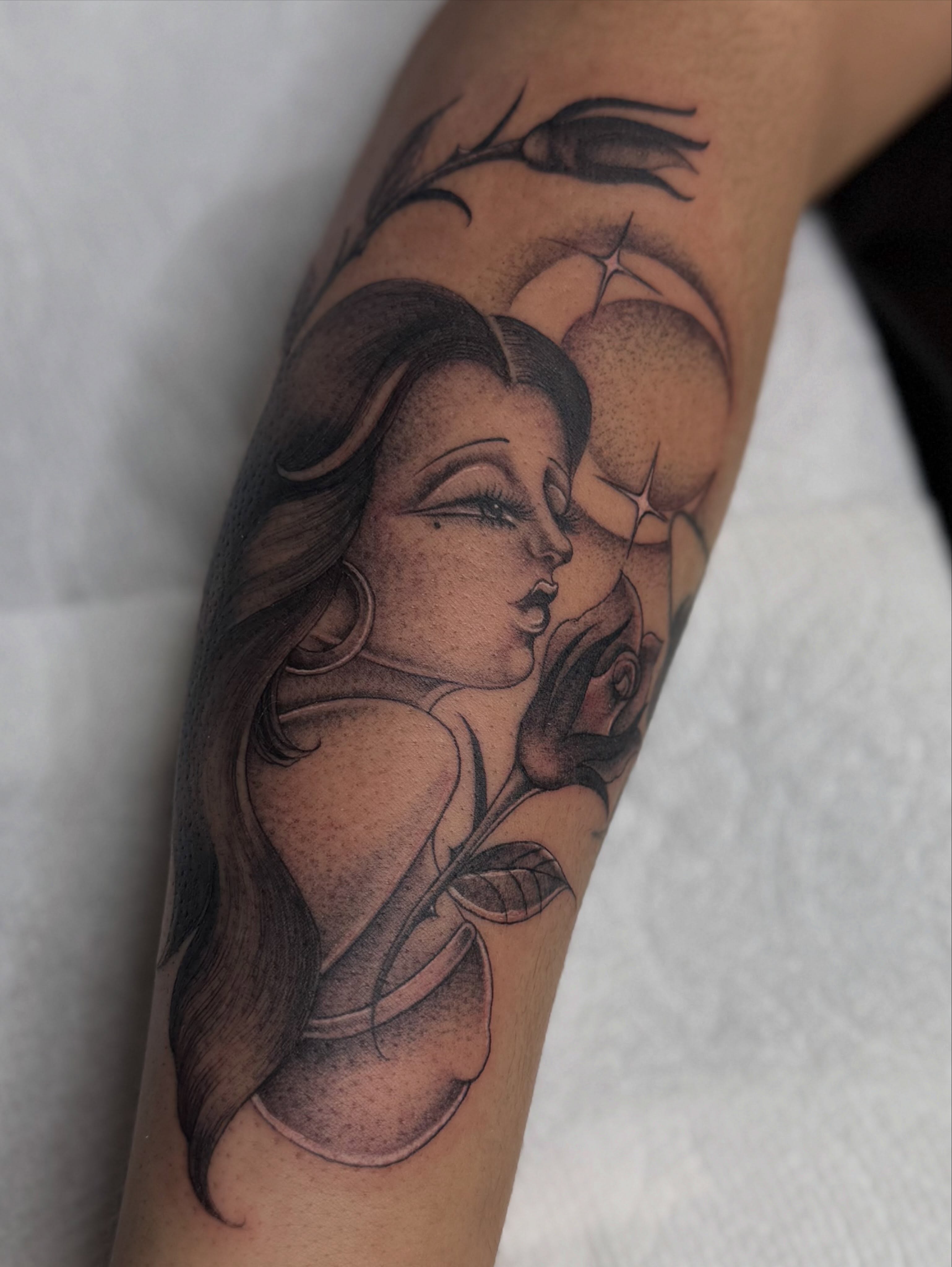 Woman with rose realism tattoo on the forearm by H e I D I