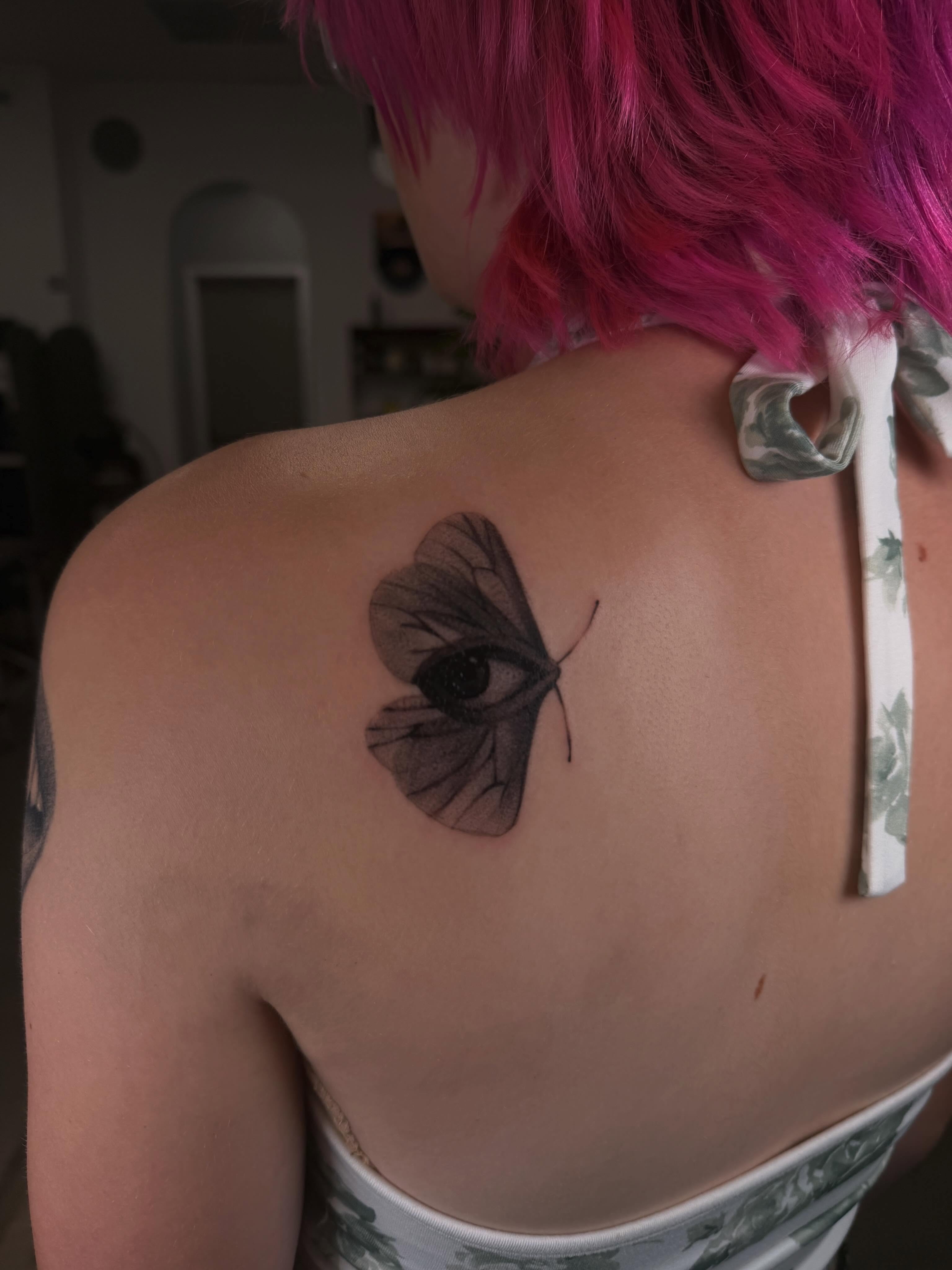 Eye and butterfly realism tattoo on the shoulder by Lxx.