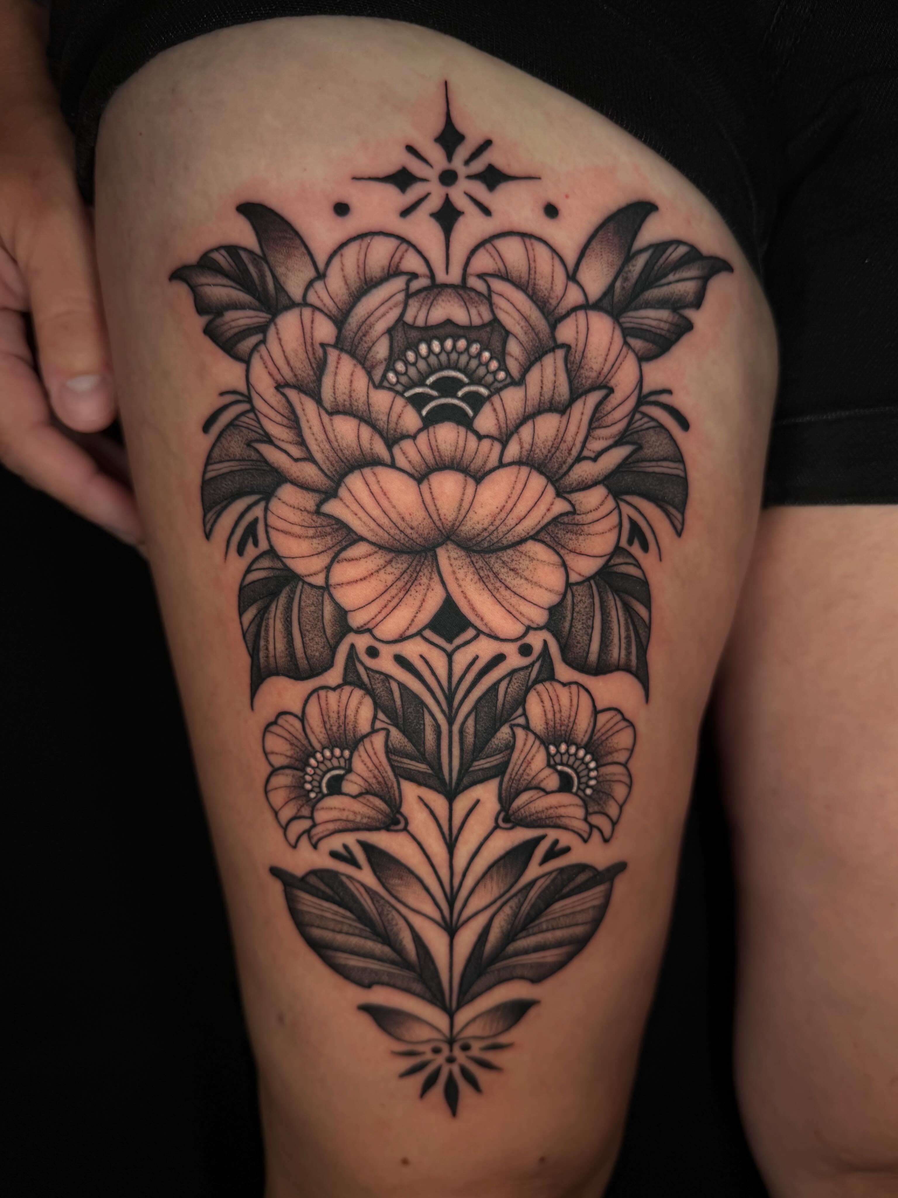 Floral arrangement American traditional tattoo on the thigh by ♥︎ ᴅᴇᴠ ʀᴇɴᴇᴇ ♥︎