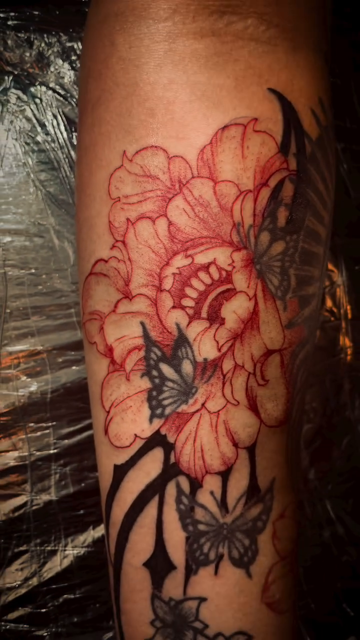 Peony and butterflies tattoo neo-traditional tattoo on the forearm by Alejandro N Duran