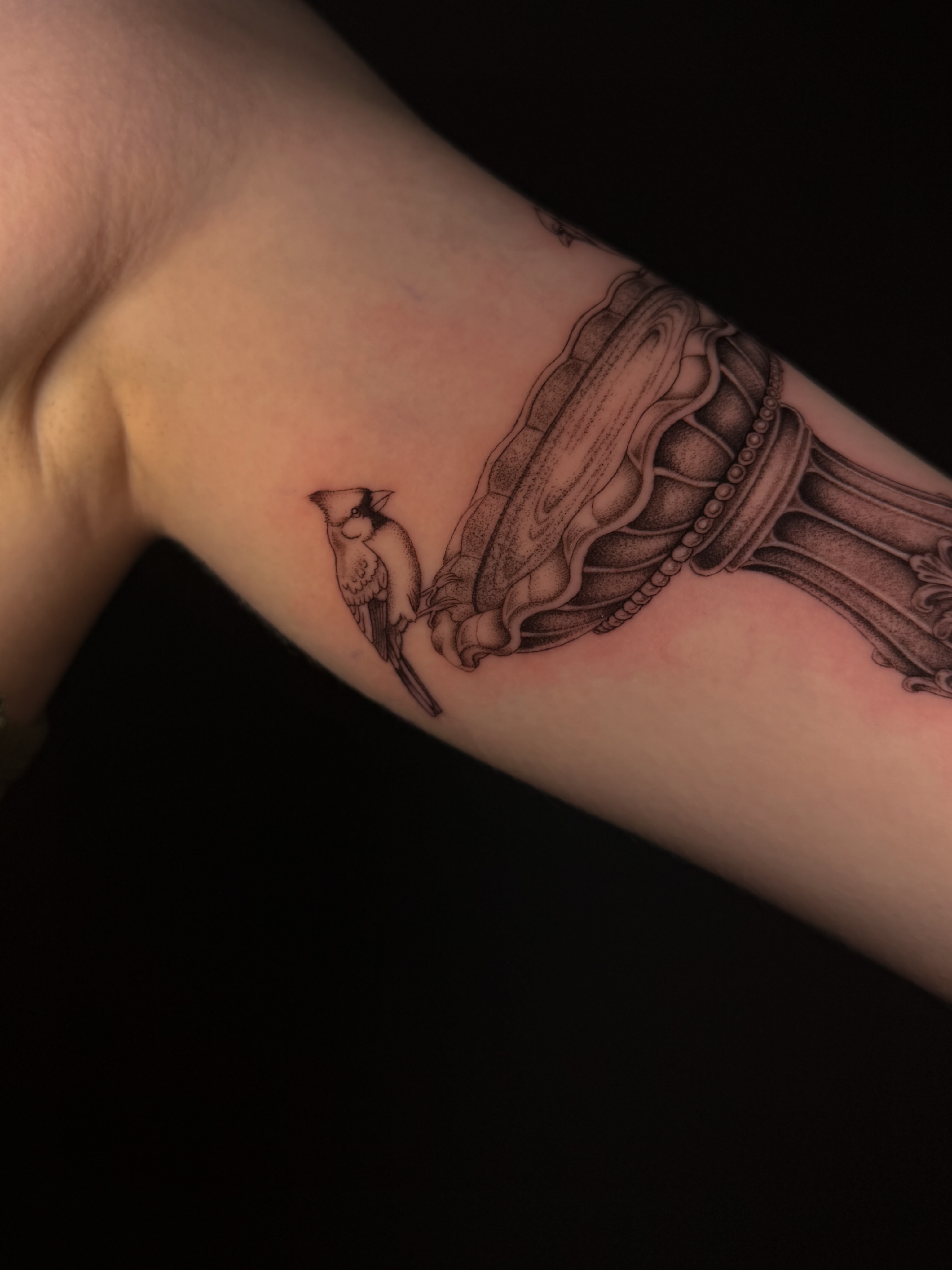 Statue black and grey tattoo on the forearm by Marianne