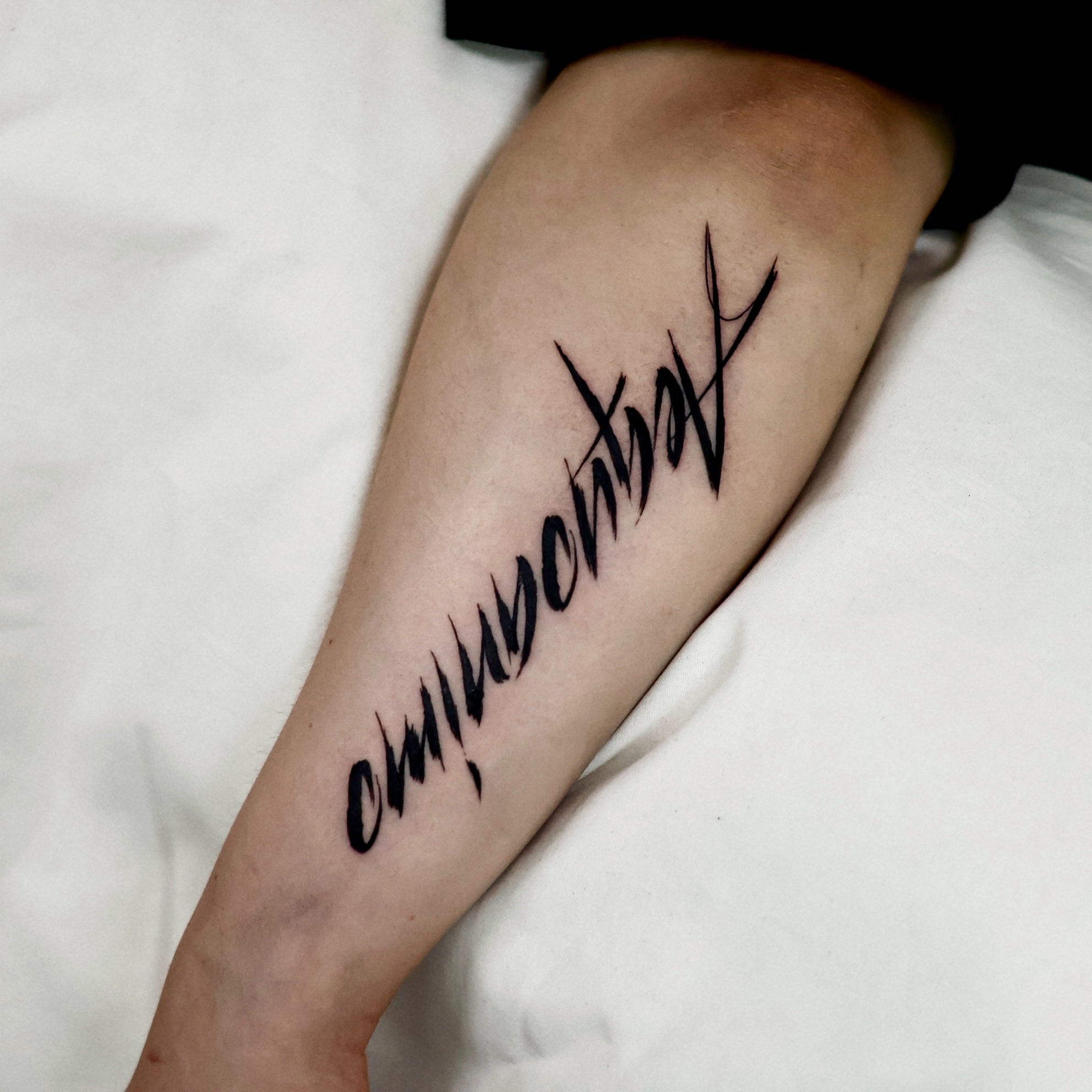 Tattoo by @tattooer_oom — lettering_script