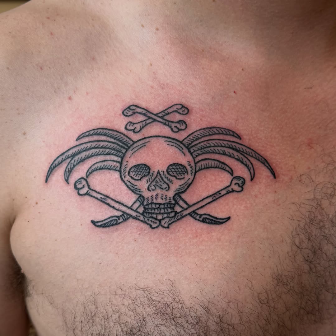 Skull and scythe black and grey tattoo on the chest by Eric Guntor, Philadelphia, Pennsylvania