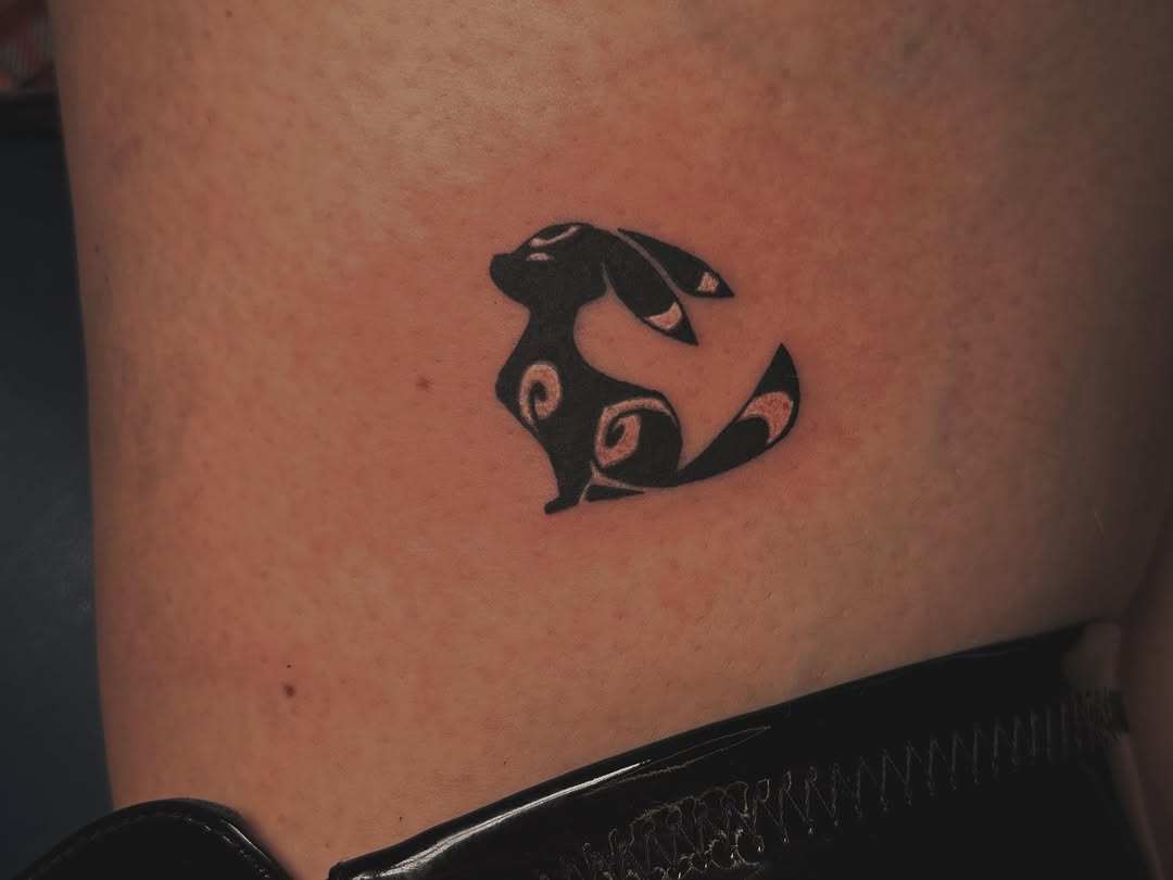 Rabbit black and grey tattoo on the thigh by Kaylee Castleton, Tooele, Utah