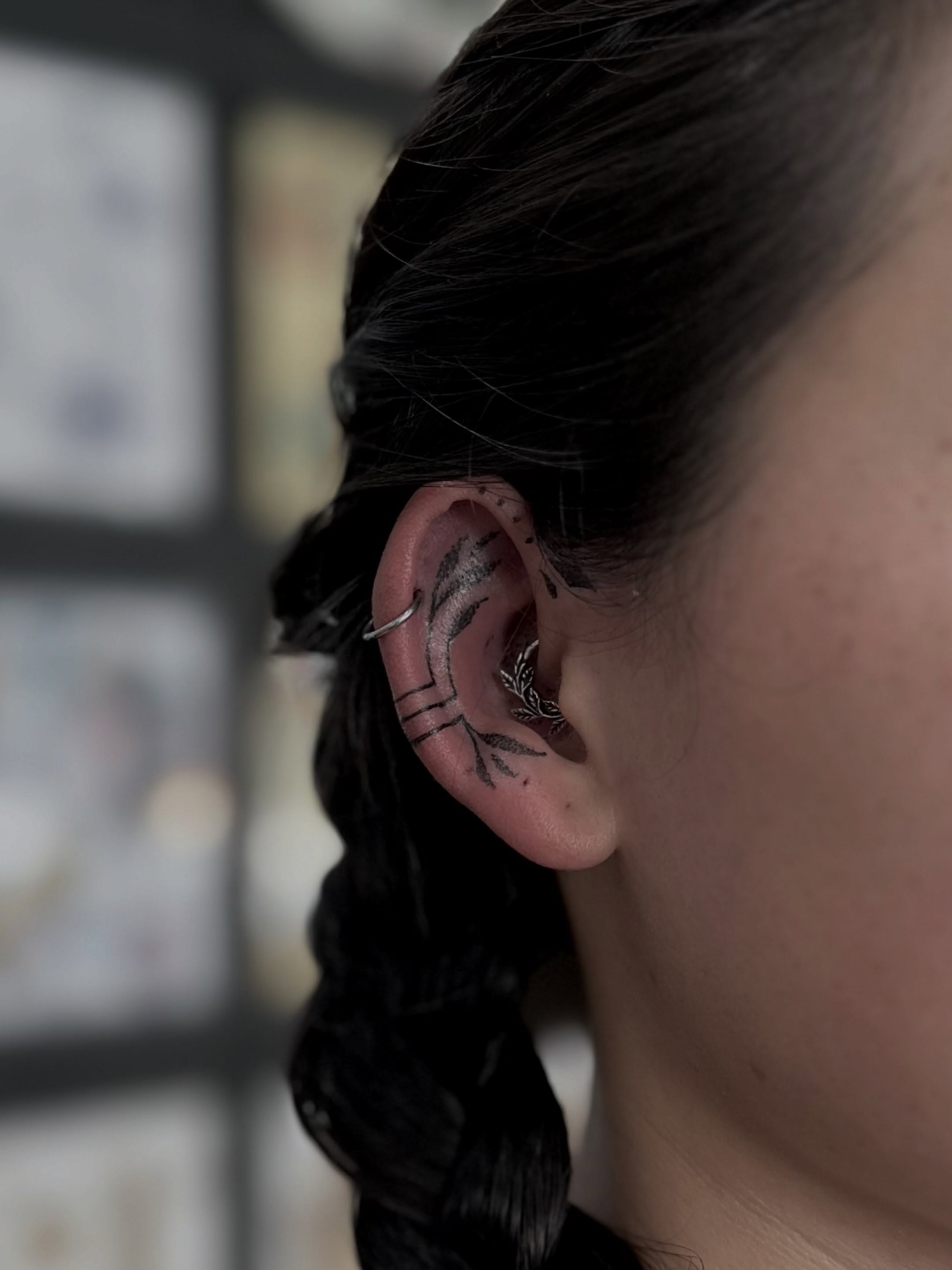 Bird and branch black and grey tattoo by Kat Fishbein