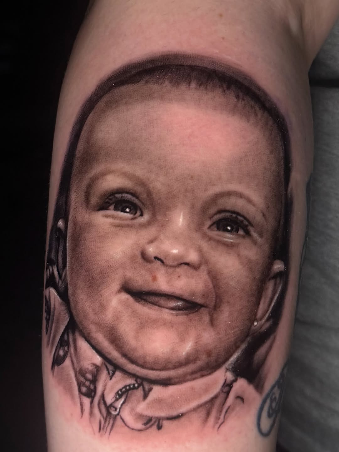 Tattoo by @burkes.body.graphic — realism, black_and_grey