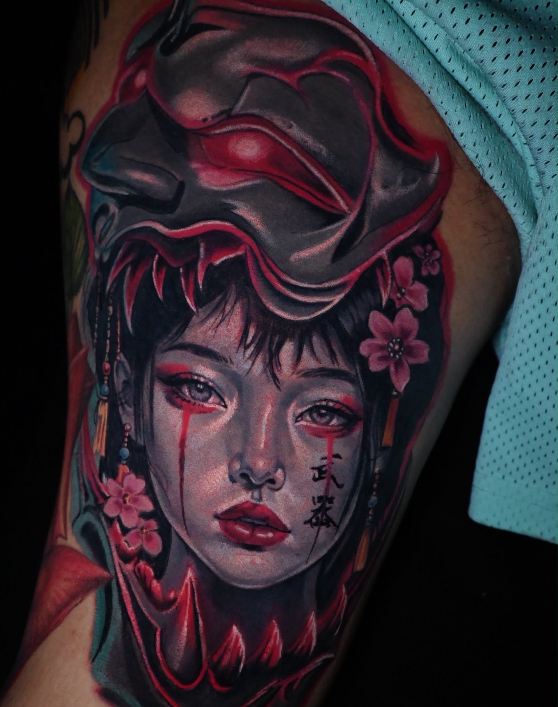 Geisha with mask neo-traditional tattoo on the thigh by William Pollock