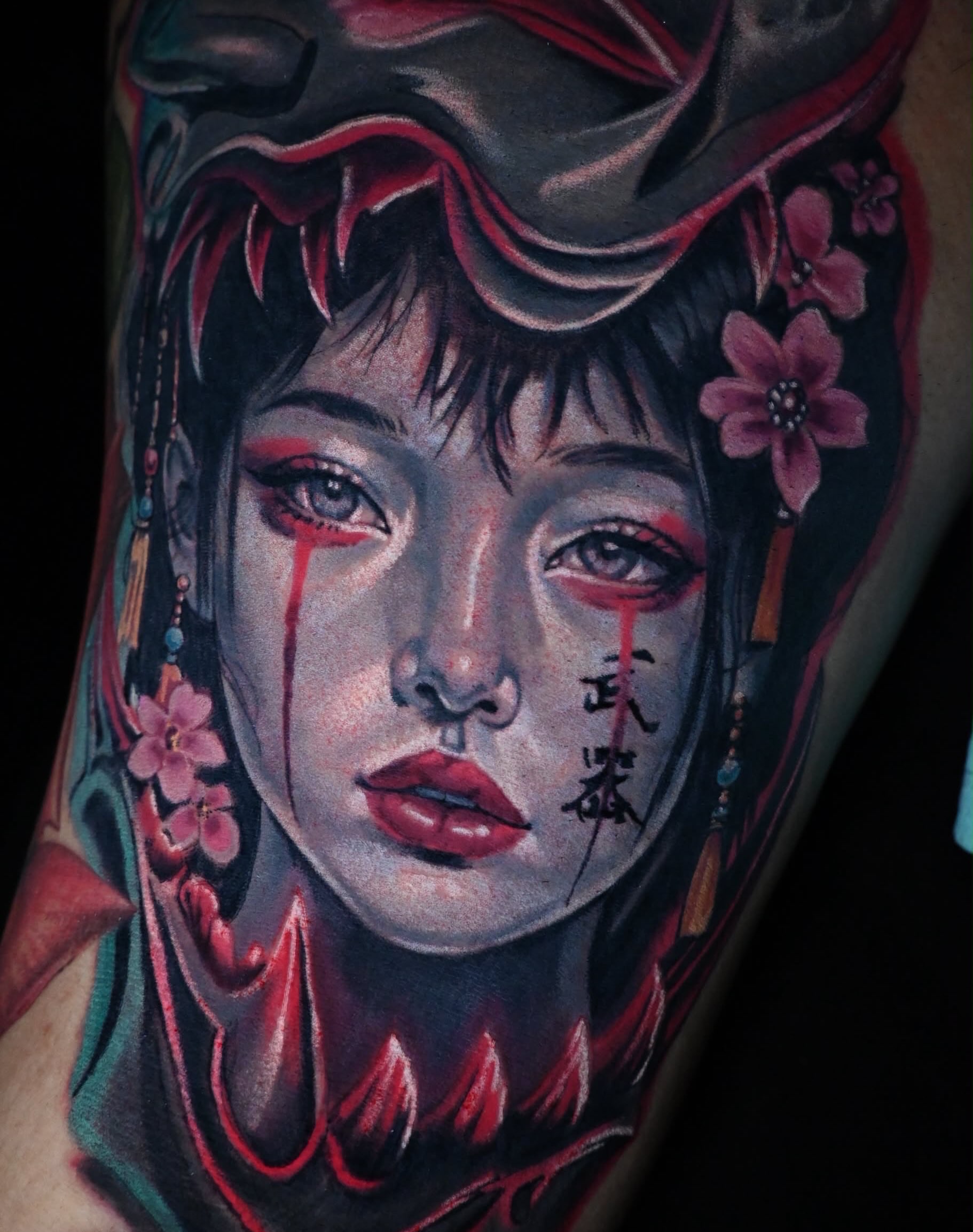 Geisha portrait with crying blood neo-traditional tattoo on the forearm by William Pollock