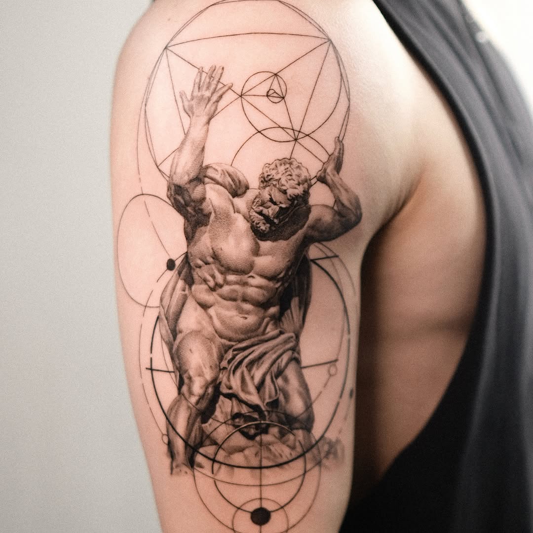 Atlas holding the celestial sphere realism tattoo on the shoulder by Taras Vandzharuk