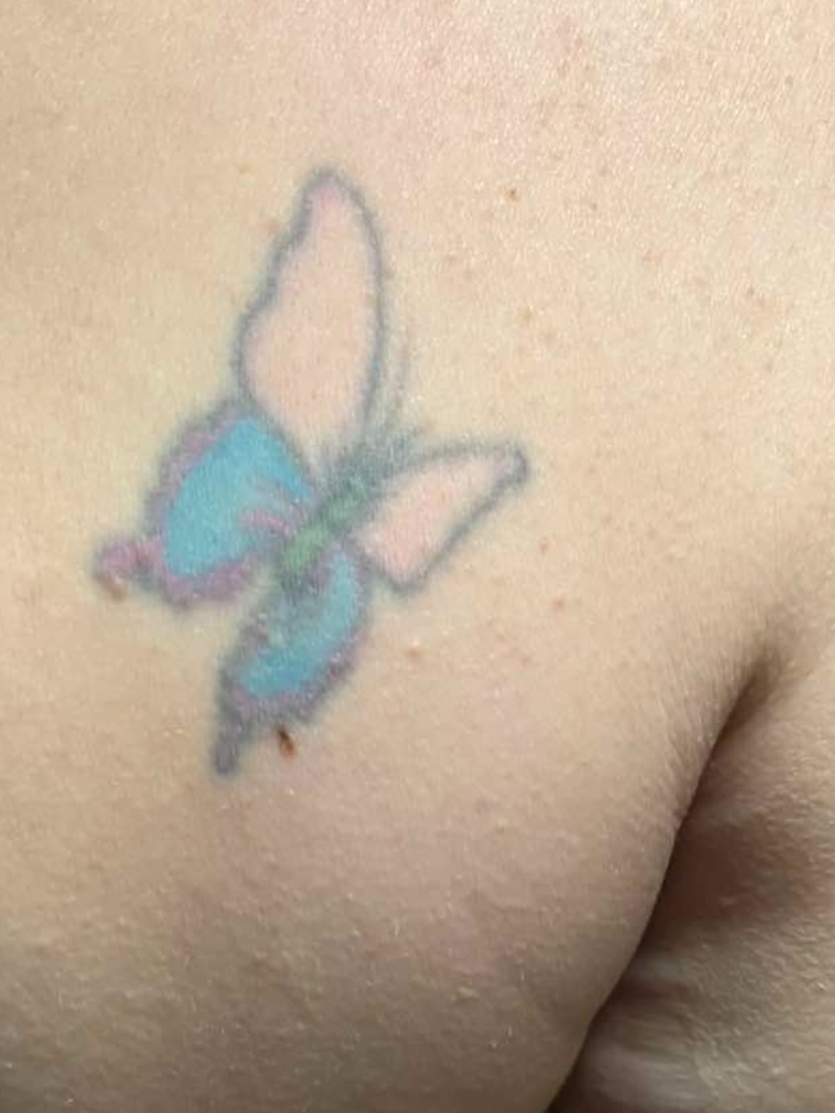 Butterfly dotwork tattoo on the forearm by Kelsie