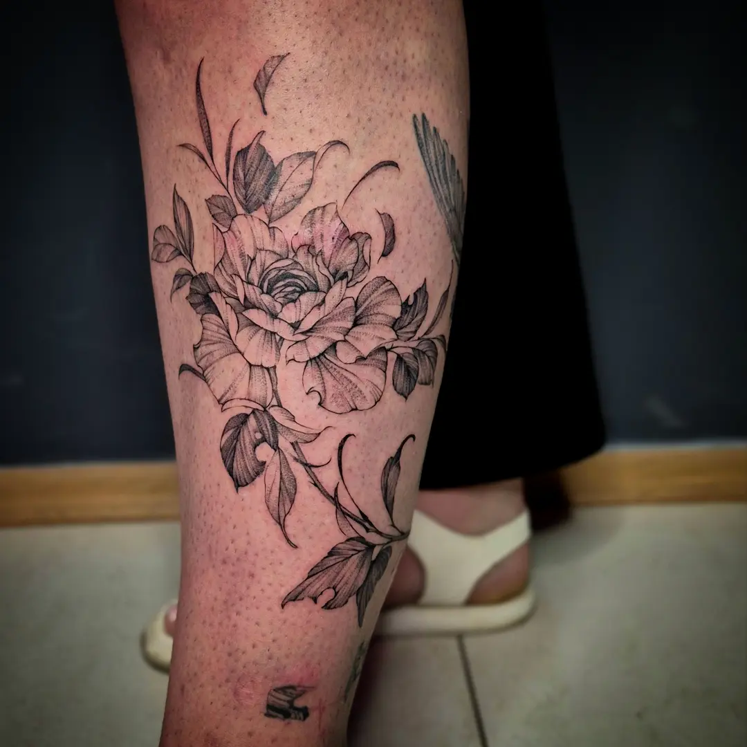 Floral bouquet black and grey tattoo on the calf by Тату Херсон _ Kherson tattoo, Kherson