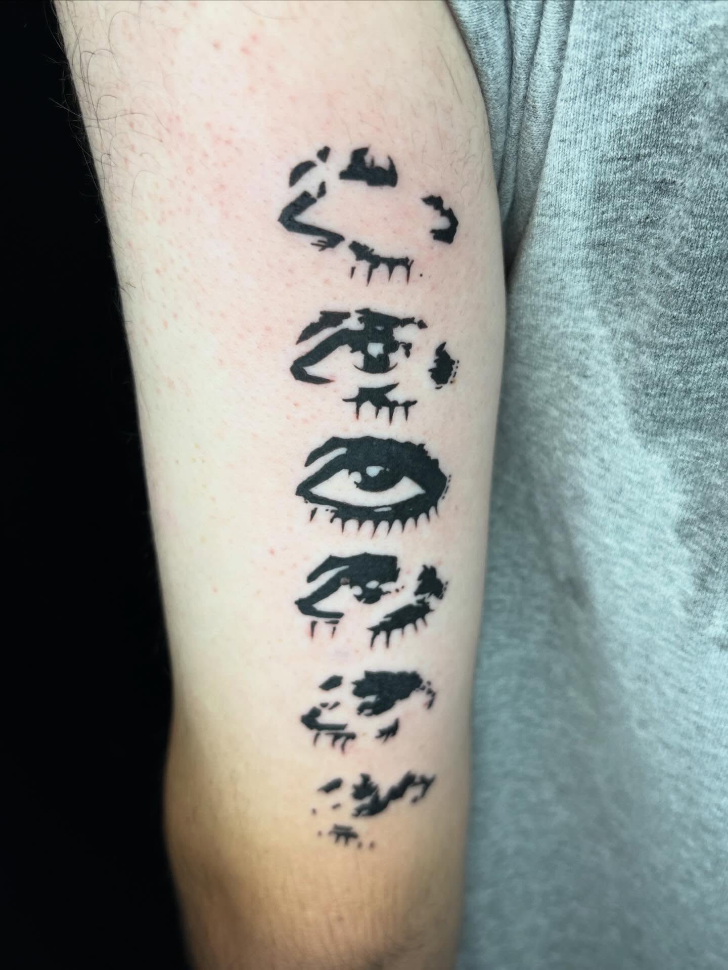 Eyes black and grey tattoo on the forearm by Pres!