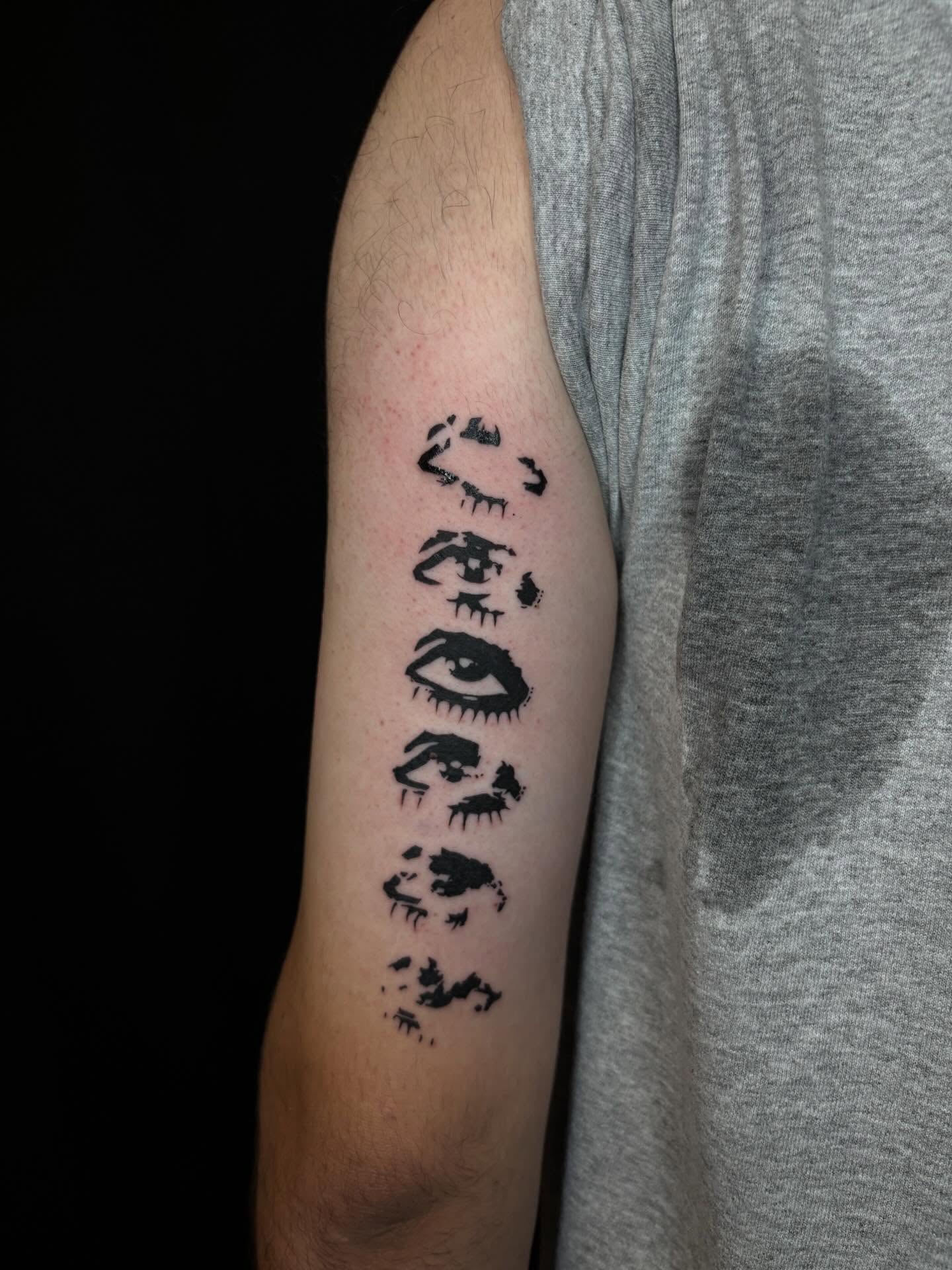 Eyes black and grey tattoo on the forearm by Pres!