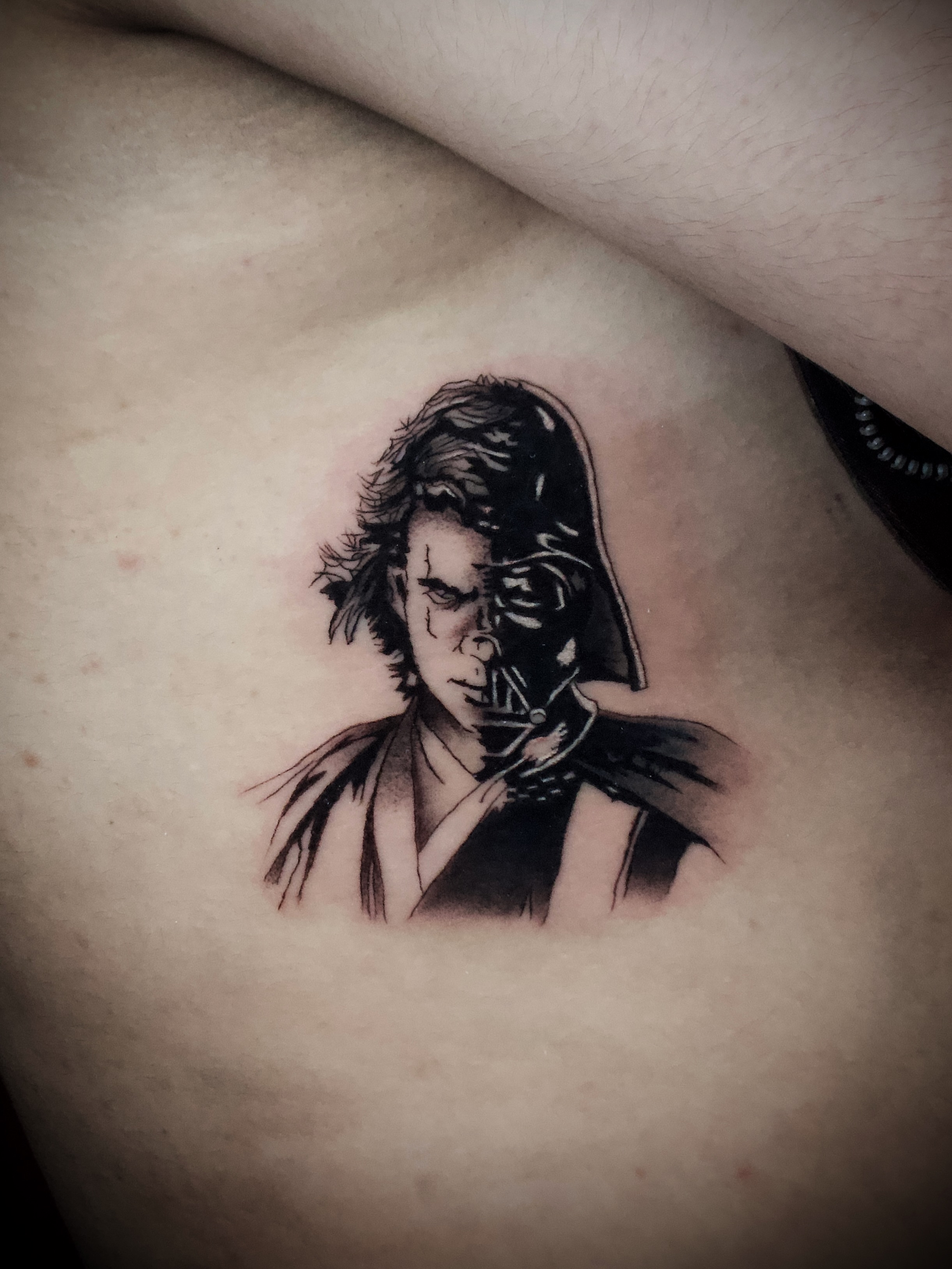 Han solo black and grey tattoo on the chest by Kanya, Alhambra, California