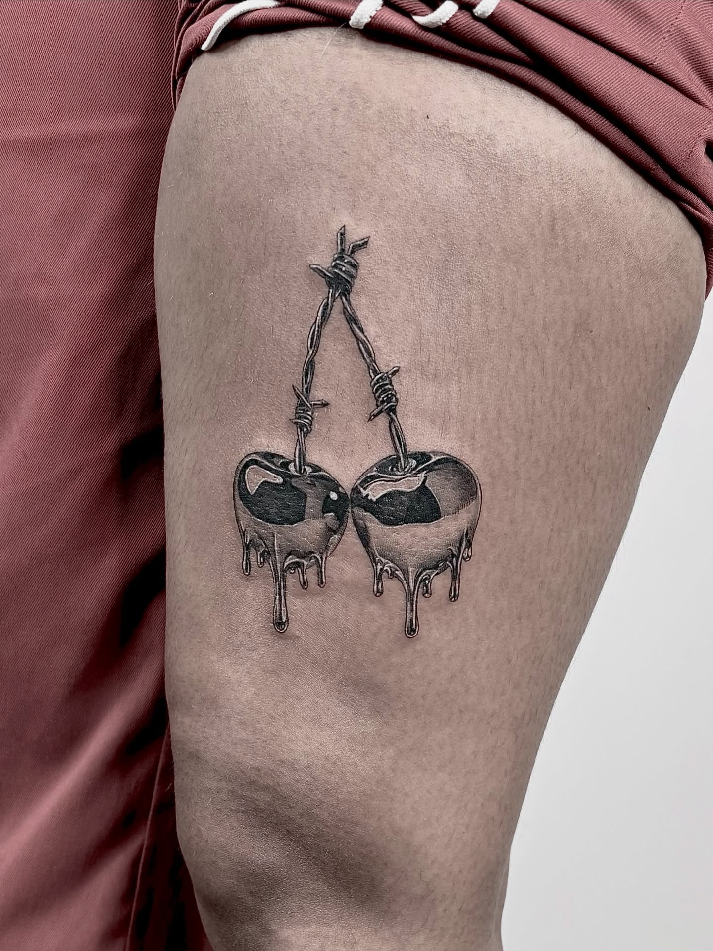 Barbed wire hearts realism tattoo on the thigh by <3 eve’s tattoos <3