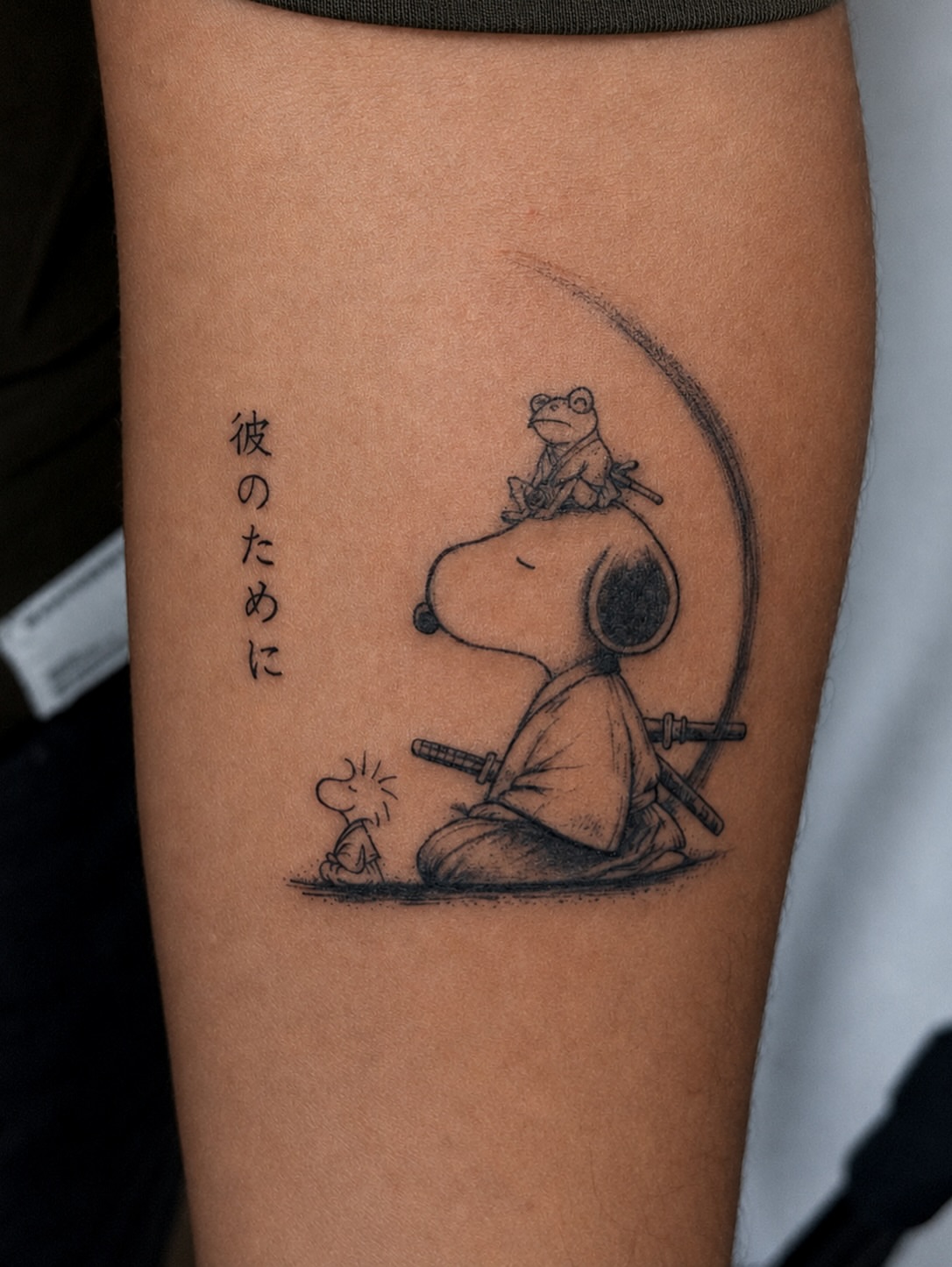 Snoopy fishing realism tattoo on the forearm by ππππππ