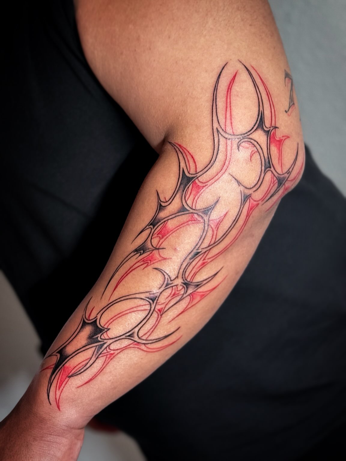 Flame geometric tattoo on the forearm by ππππππ
