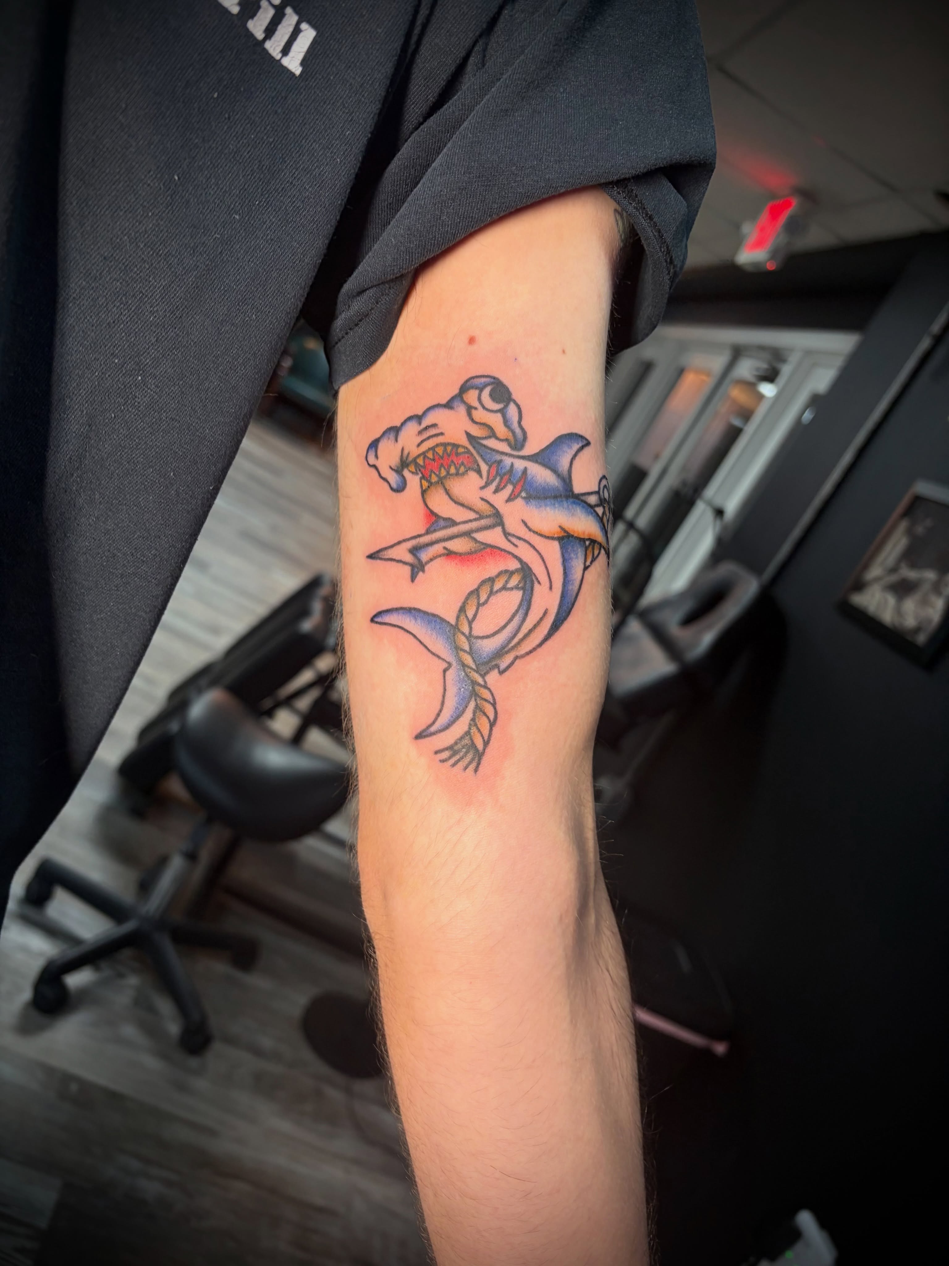 Shark American traditional tattoo on the forearm by Kiersten Tickle