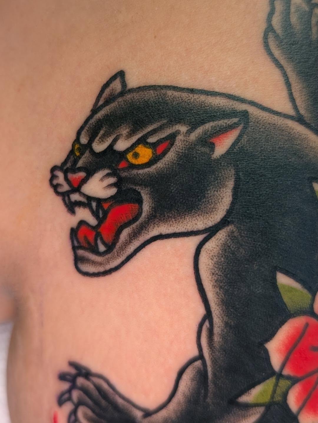 Panther American traditional tattoo on the chest by Erik O'Steen, Medford, Massachusetts