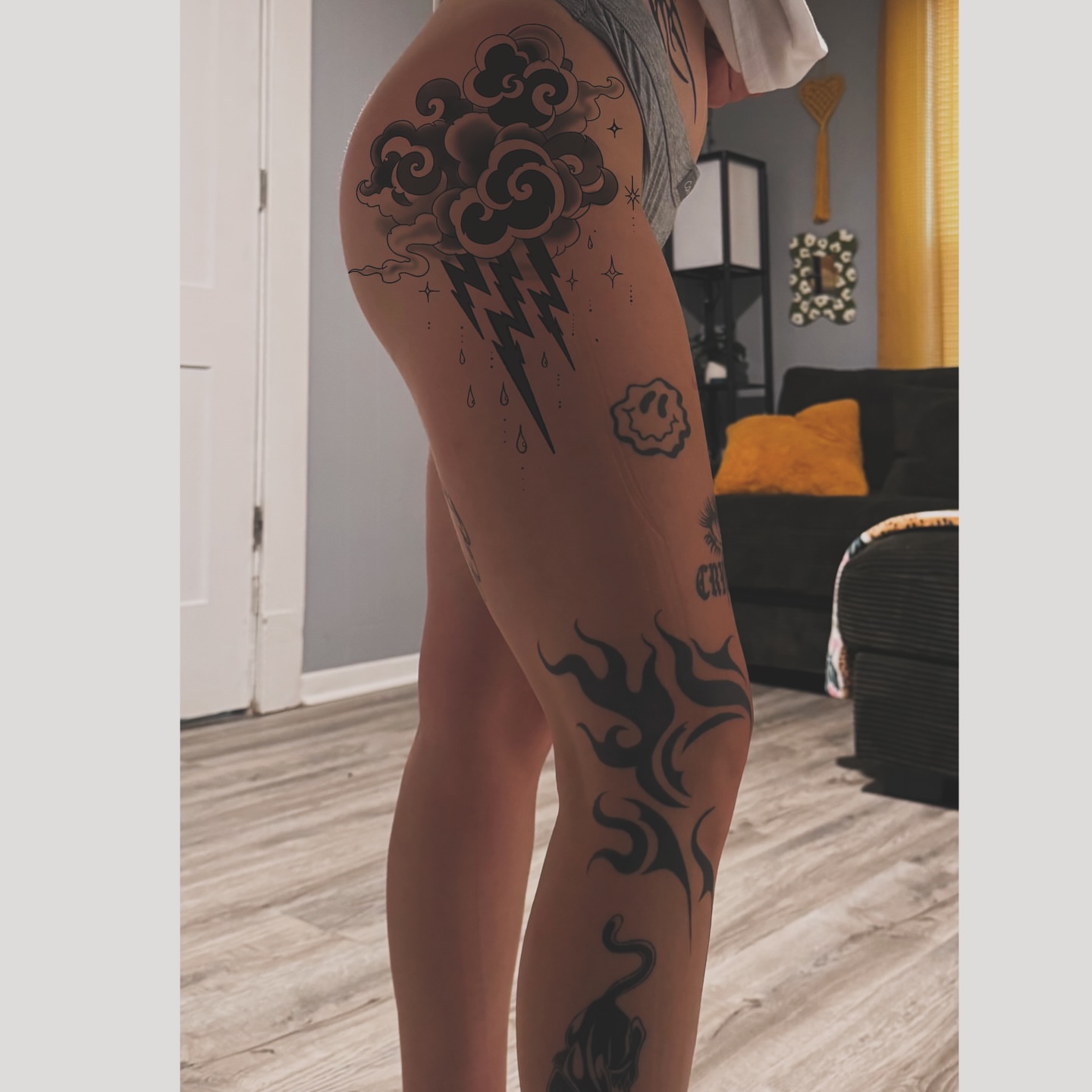 Thunderstorm black and grey tattoo on the thigh by ⚜️Embodied Tattoo⚜️, Columbus, Ohio