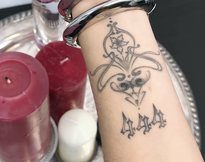 Floral design black and grey tattoo on the forearm by Ava De La Torre